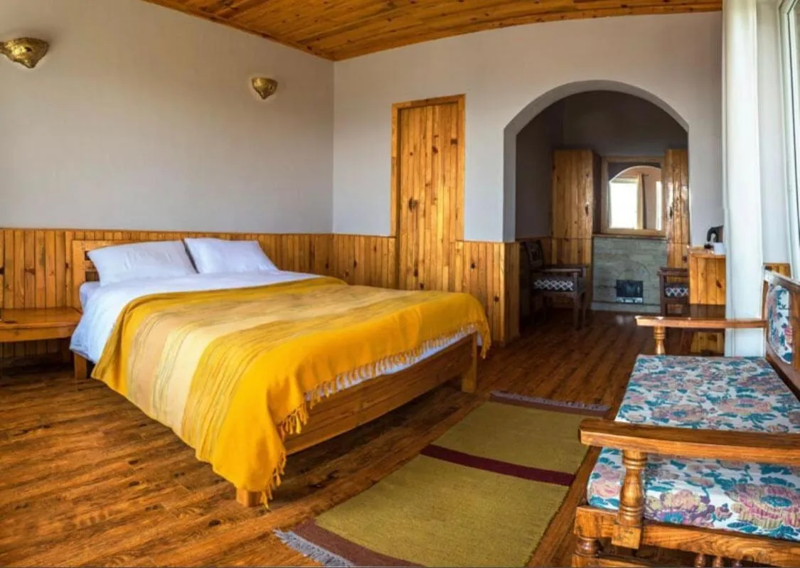 Bed in Kasar Rainbow Yoga Retreat