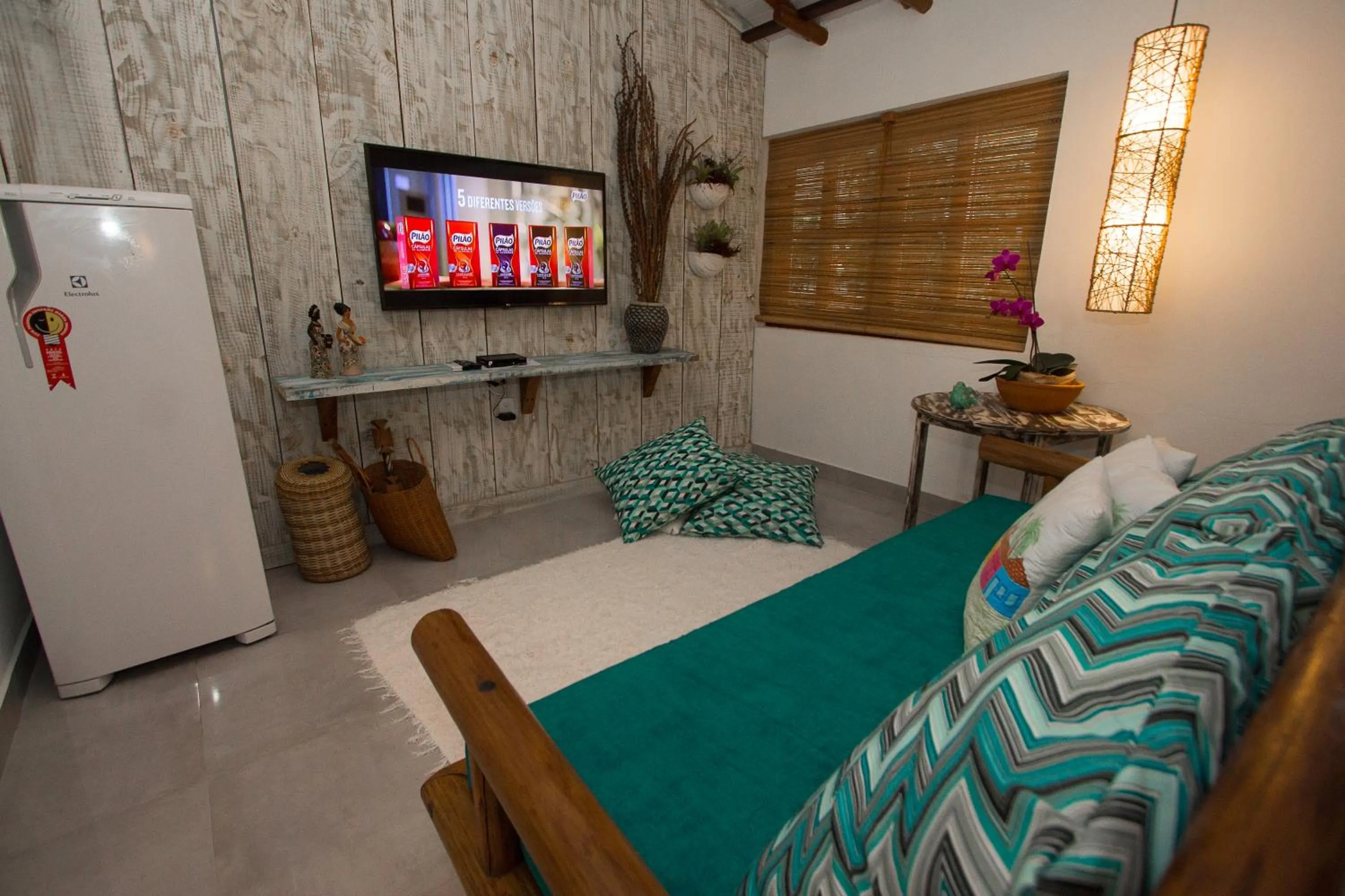 Communal lounge/ TV room, Bed in Rio Da Barra Villa Hotel