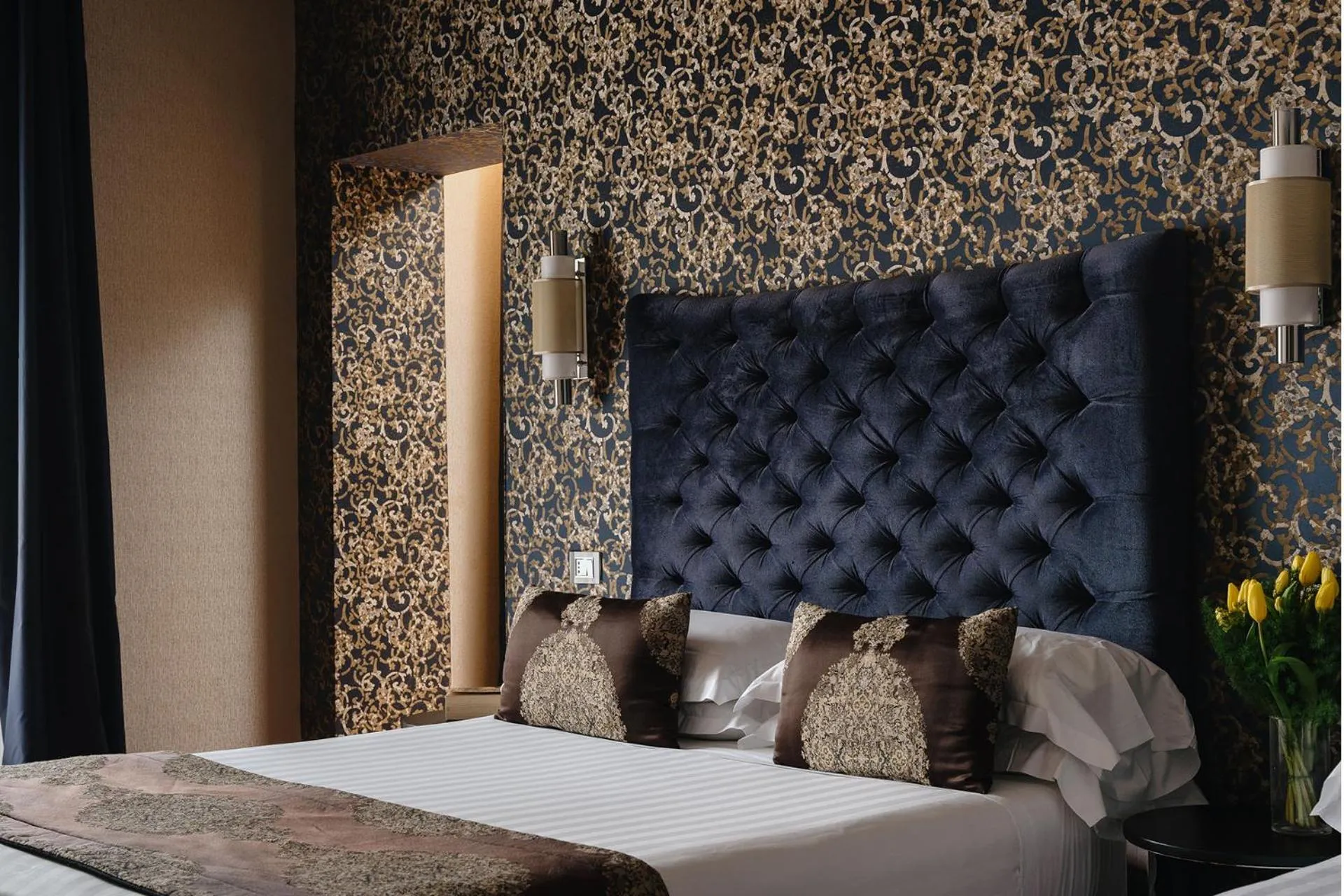 Bed in Unica Suites Rome