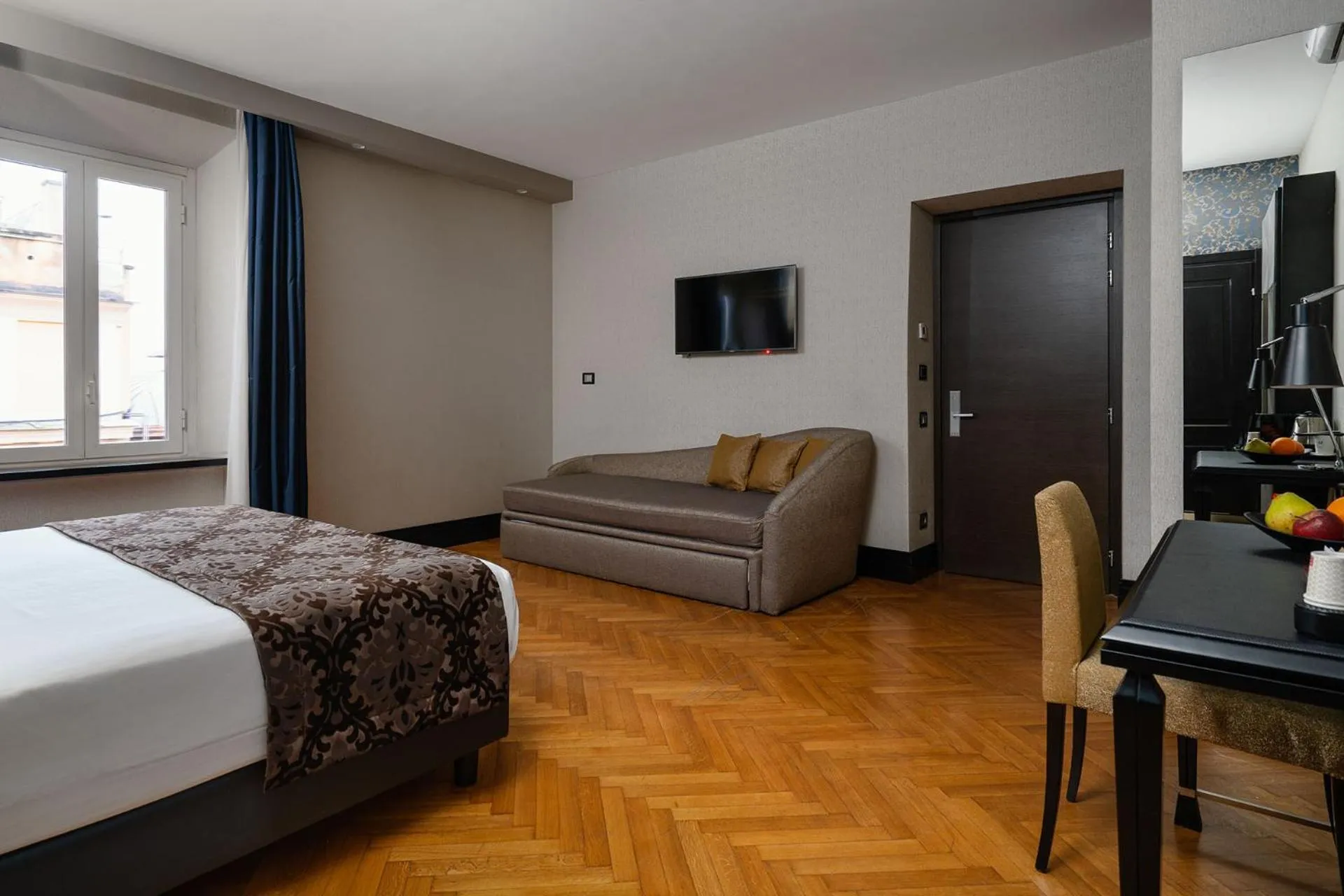 Bed in Unica Suites Rome