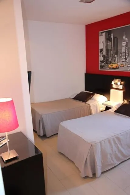 Photo of the whole room, Bed in Hostal Central