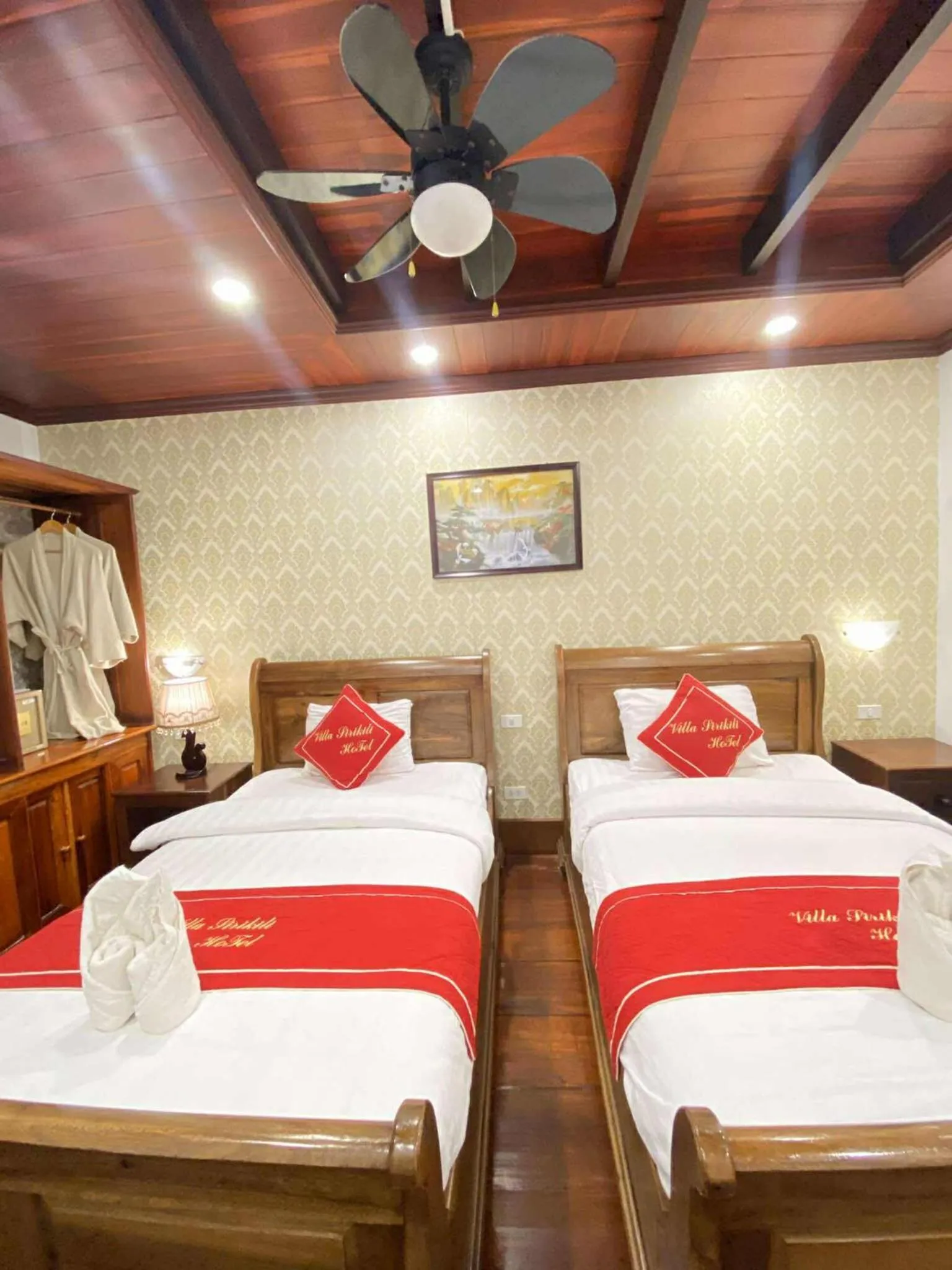 Bed in Villa Sirikili Hotel Luang Prabang