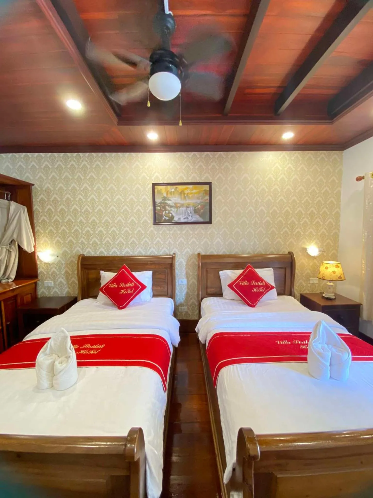 Bed in Villa Sirikili Hotel Luang Prabang