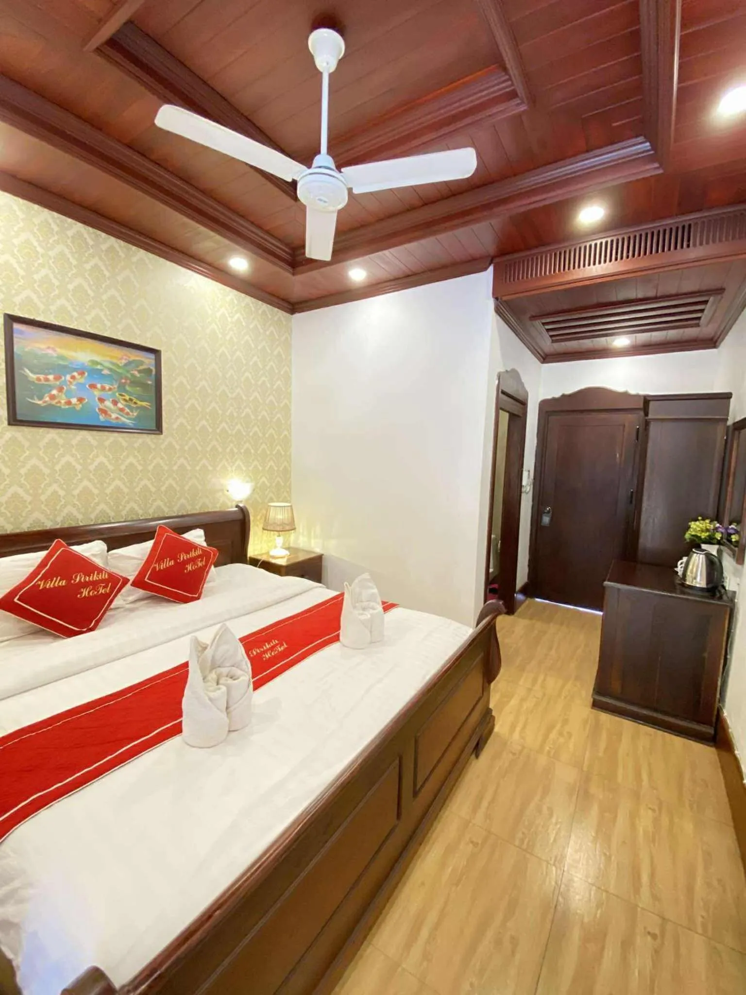 Photo of the whole room, Bed in Villa Sirikili Hotel Luang Prabang