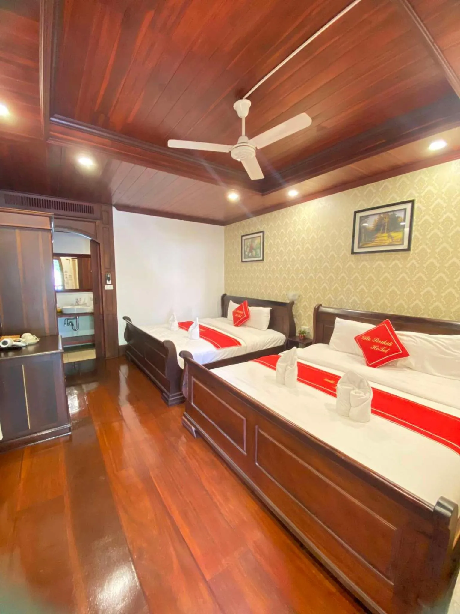 Photo of the whole room, Bed in Villa Sirikili Hotel Luang Prabang