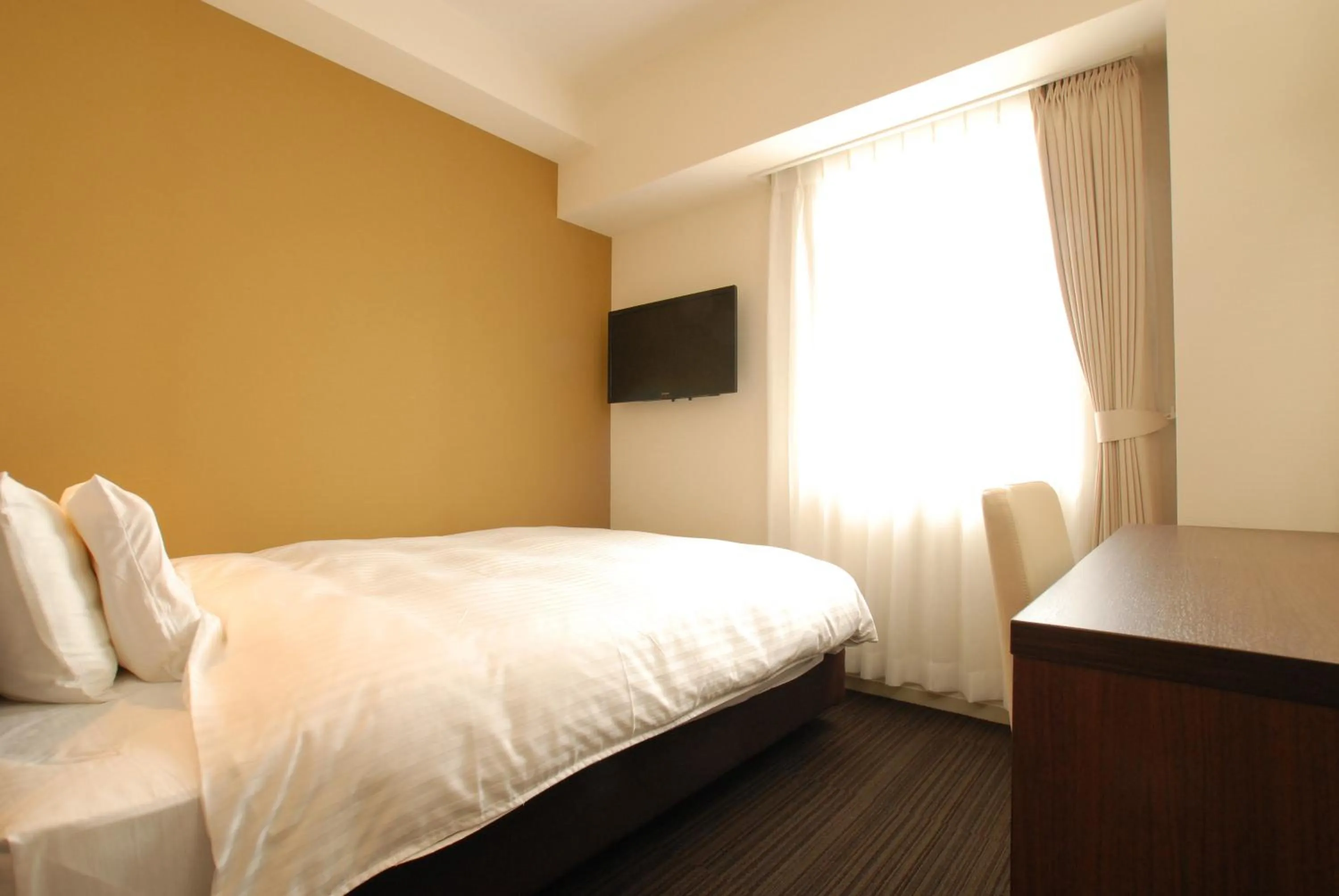 Bed in AB Hotel Fukaya