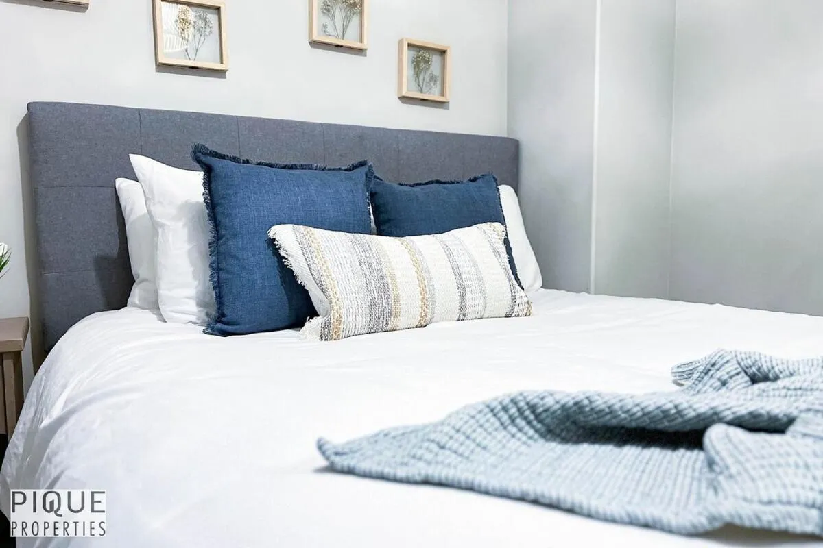 Bed in Chic Retreat with Hot Tub - King Bed - Fireplace - WEM