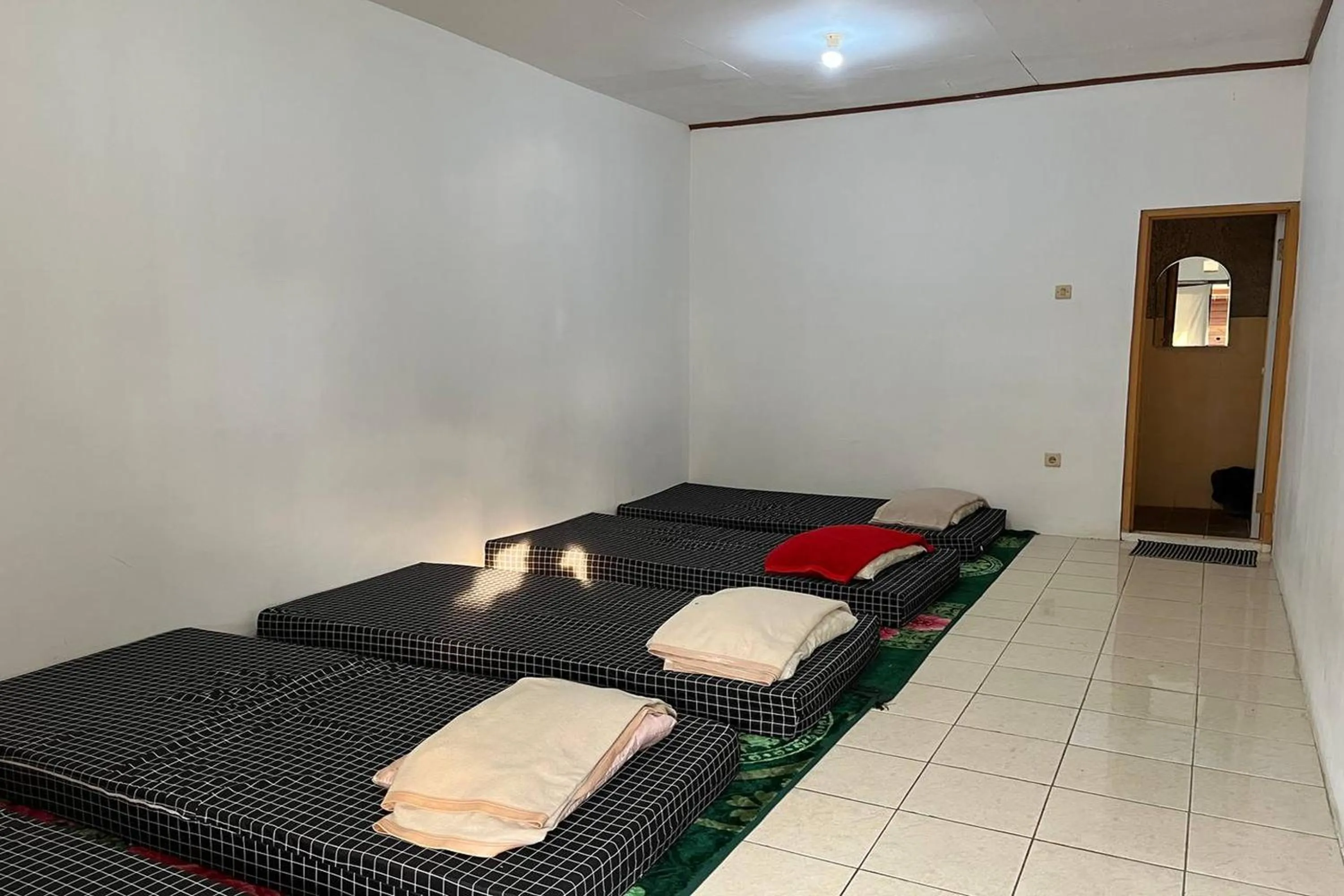 Bed in Tjapoeng Resort Pancawati