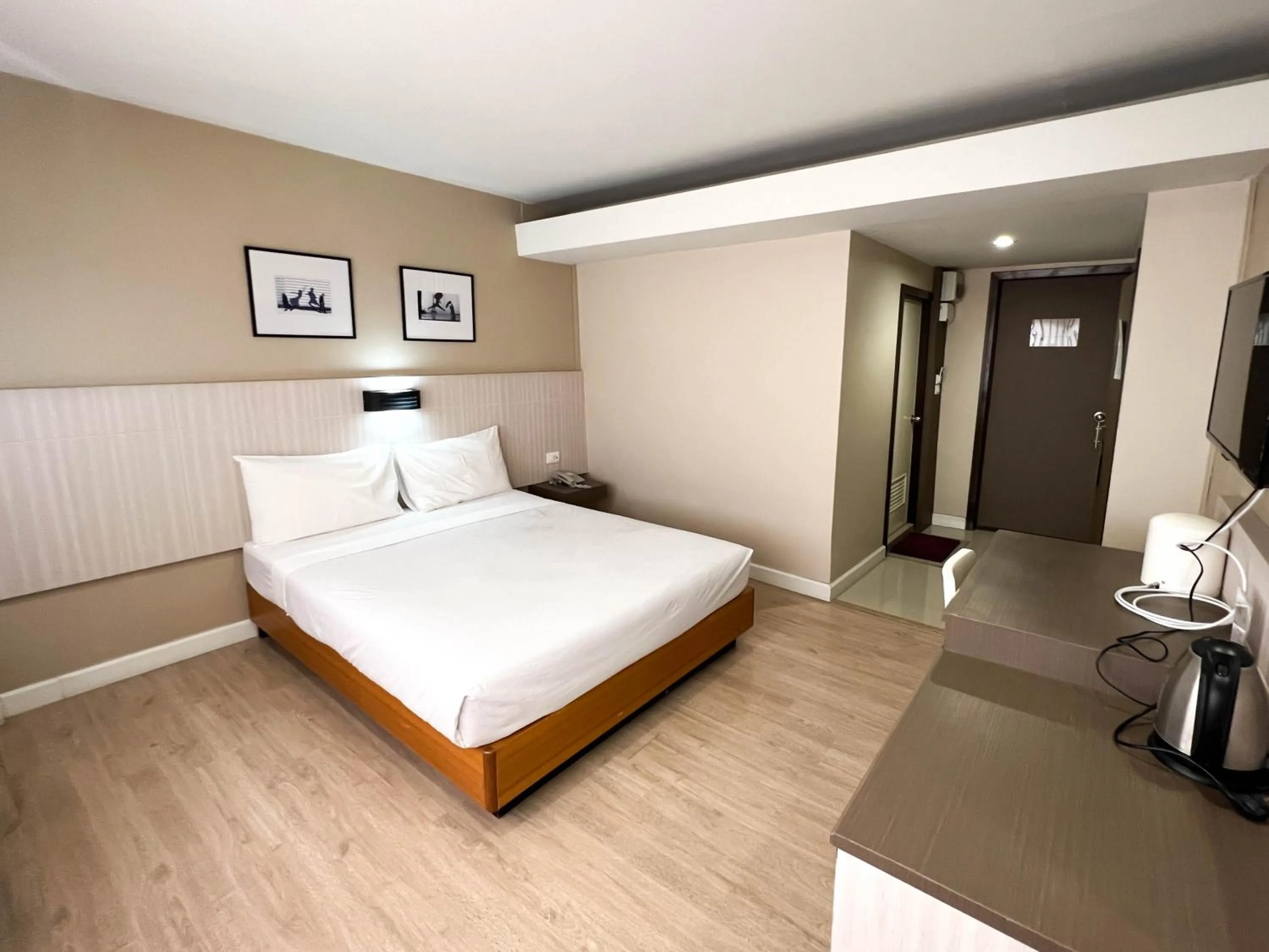 Bed in Srivichai Hotel