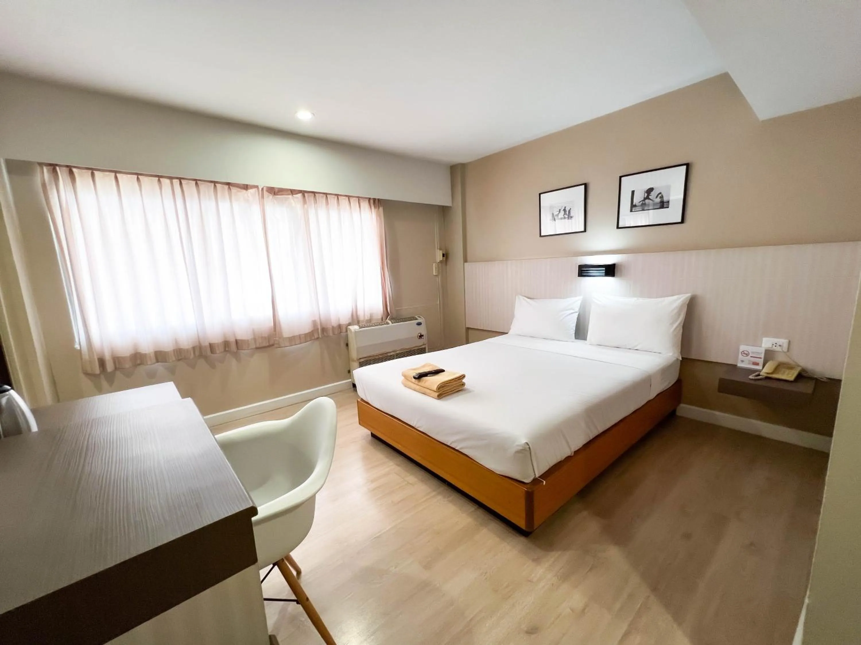 Bed in Srivichai Hotel