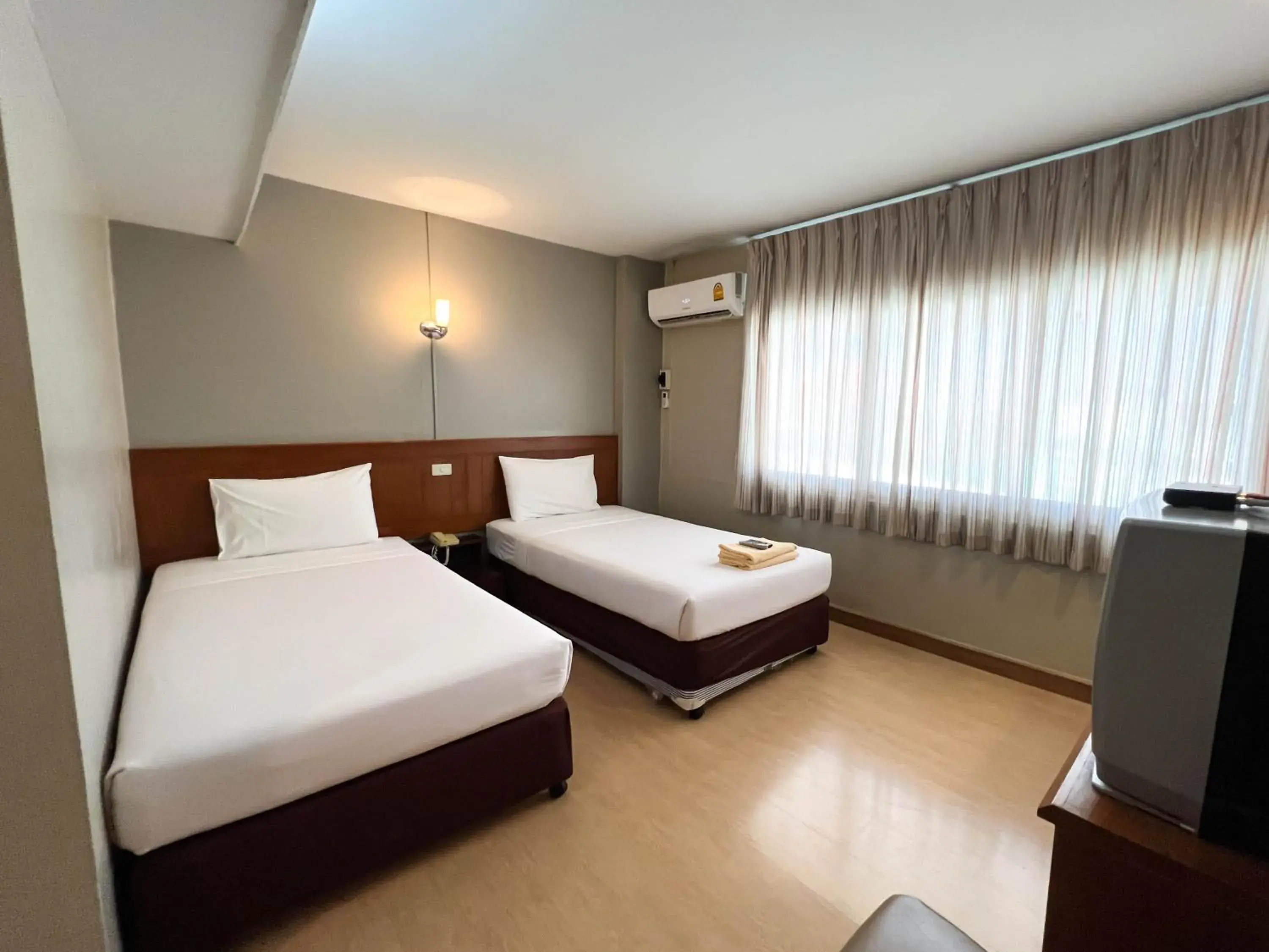 Standard Twin Room in Srivichai Hotel Standard Twin Room in Srivichai Hotel