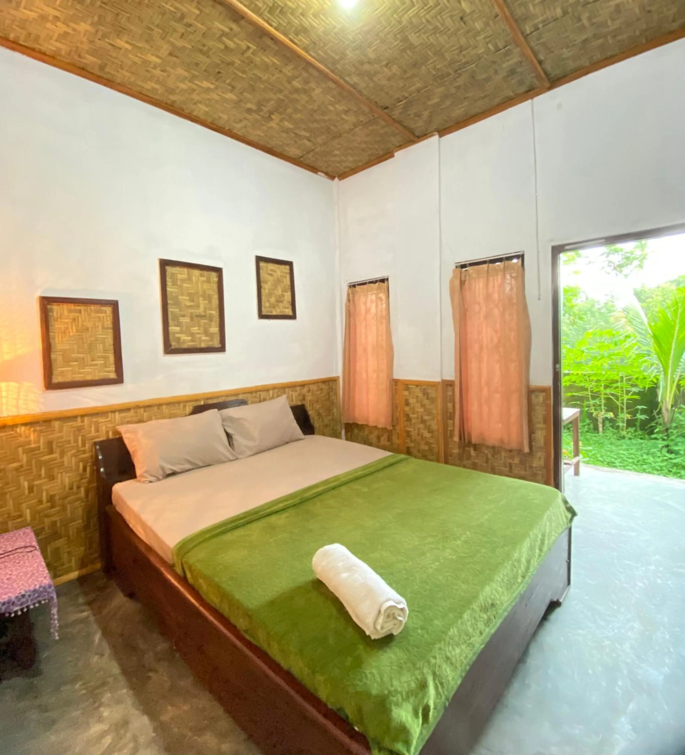 Bed in Kembang Kuning Cottages