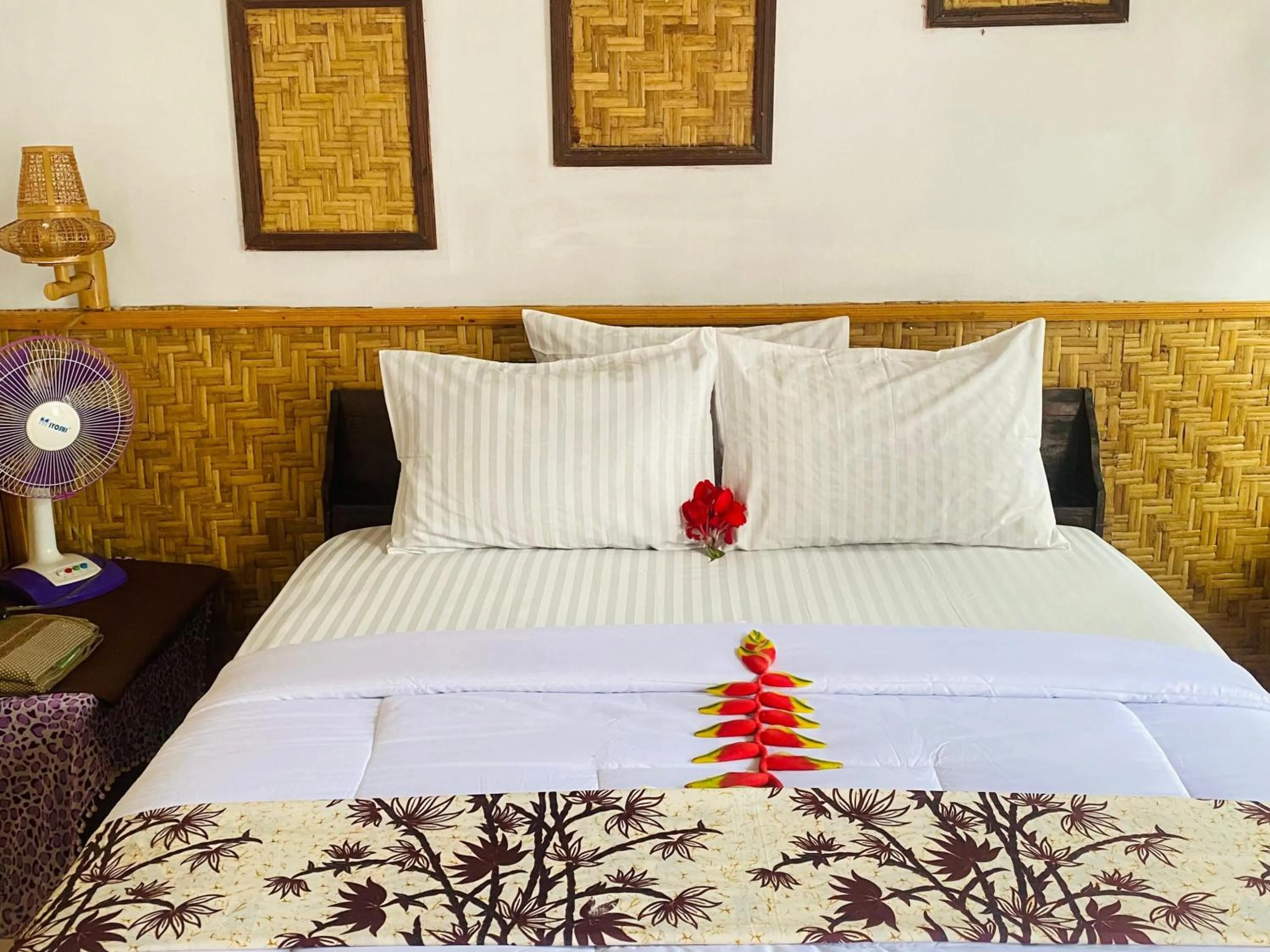 Bed in Kembang Kuning Cottages