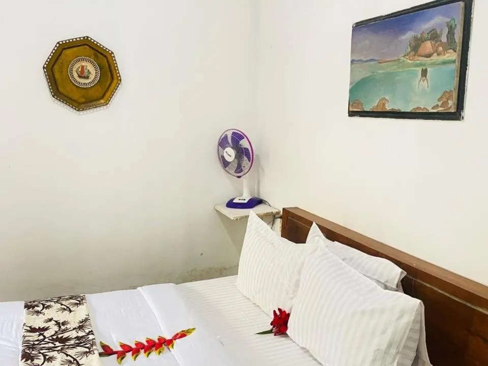 Bed in Kembang Kuning Cottages