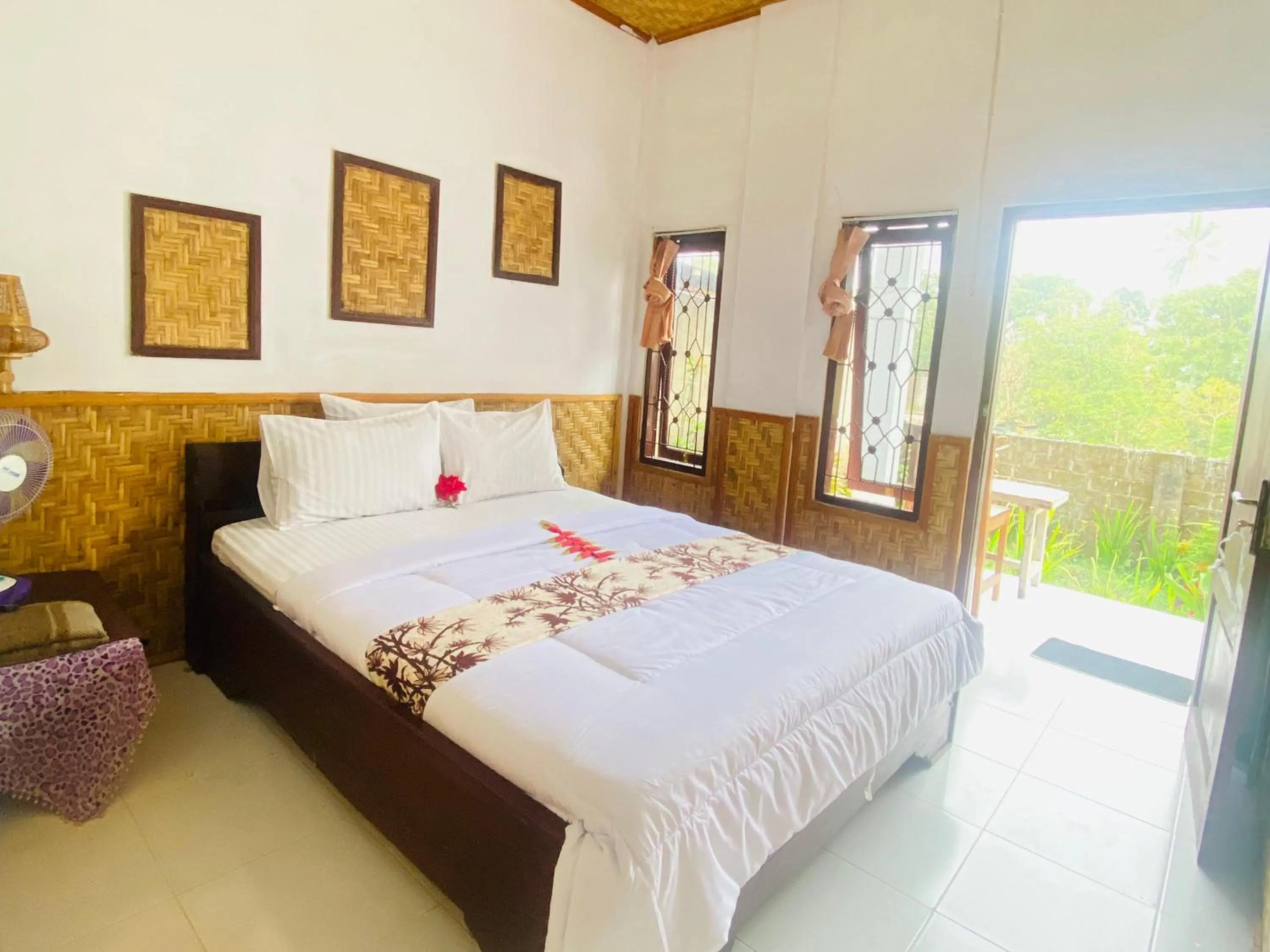 Bed in Kembang Kuning Cottages