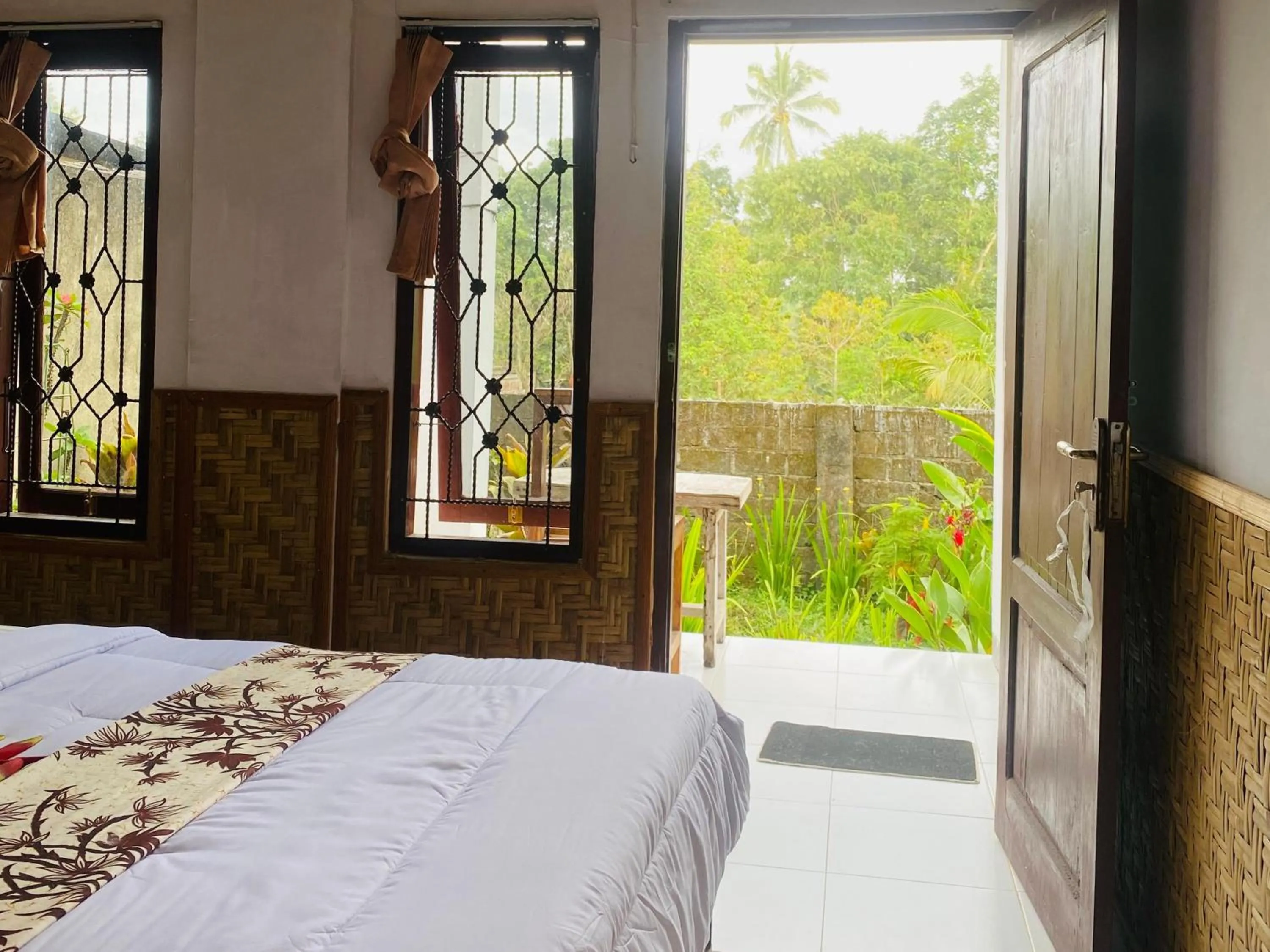 Bed in Kembang Kuning Cottages