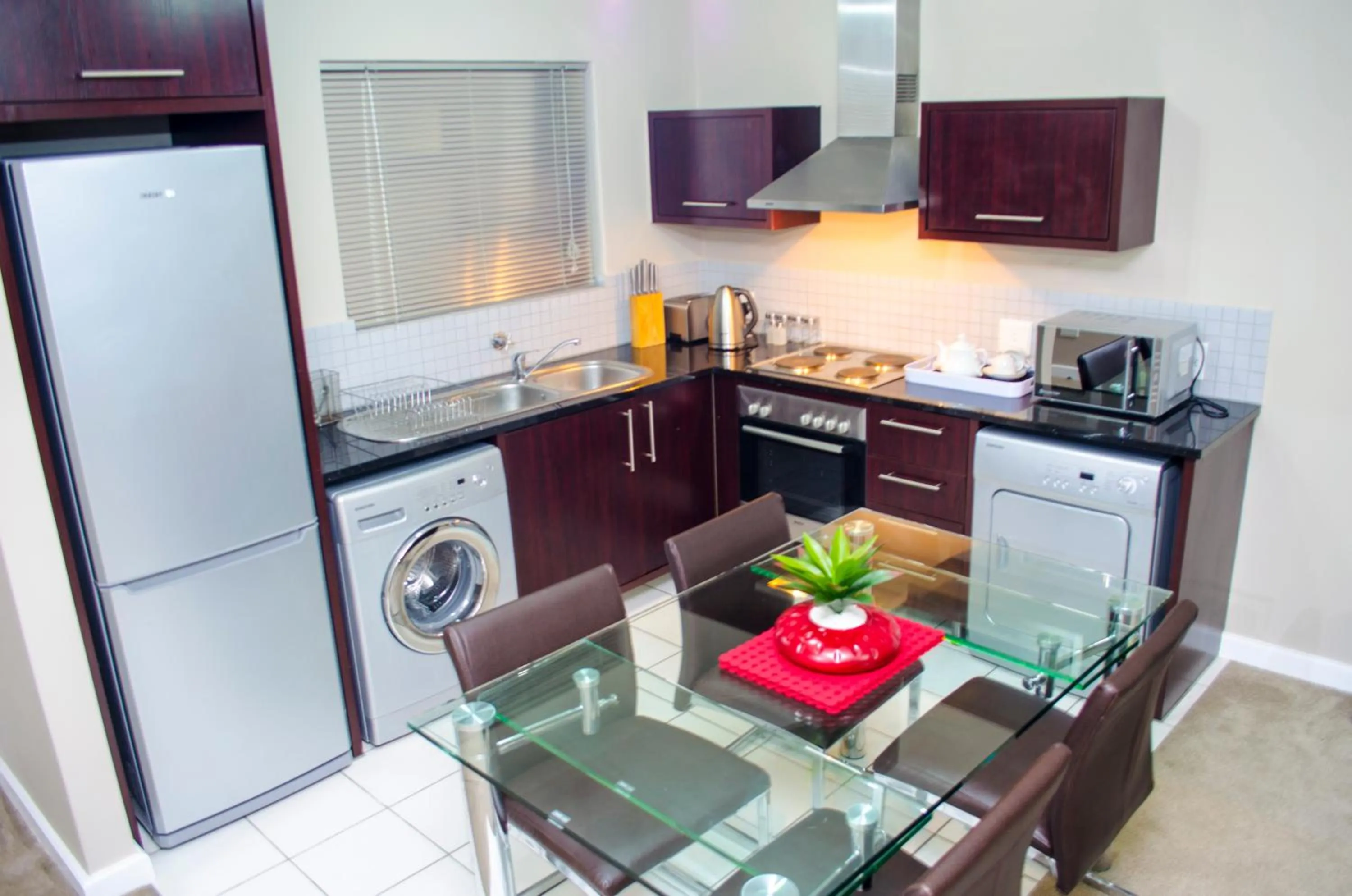 Kitchen or kitchenette in Knightsbridge Luxury Apartments