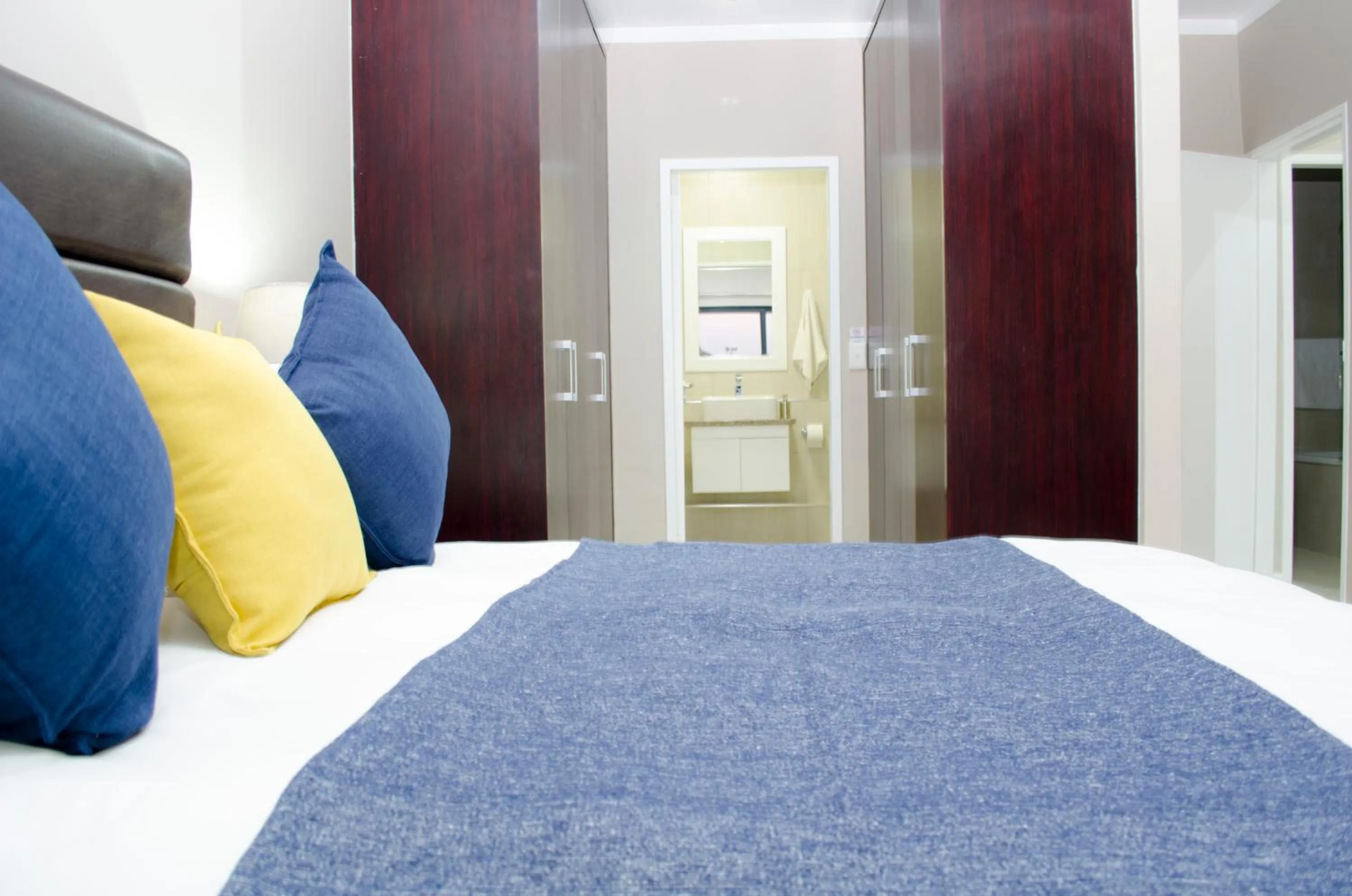 Bed in Knightsbridge Luxury Apartments