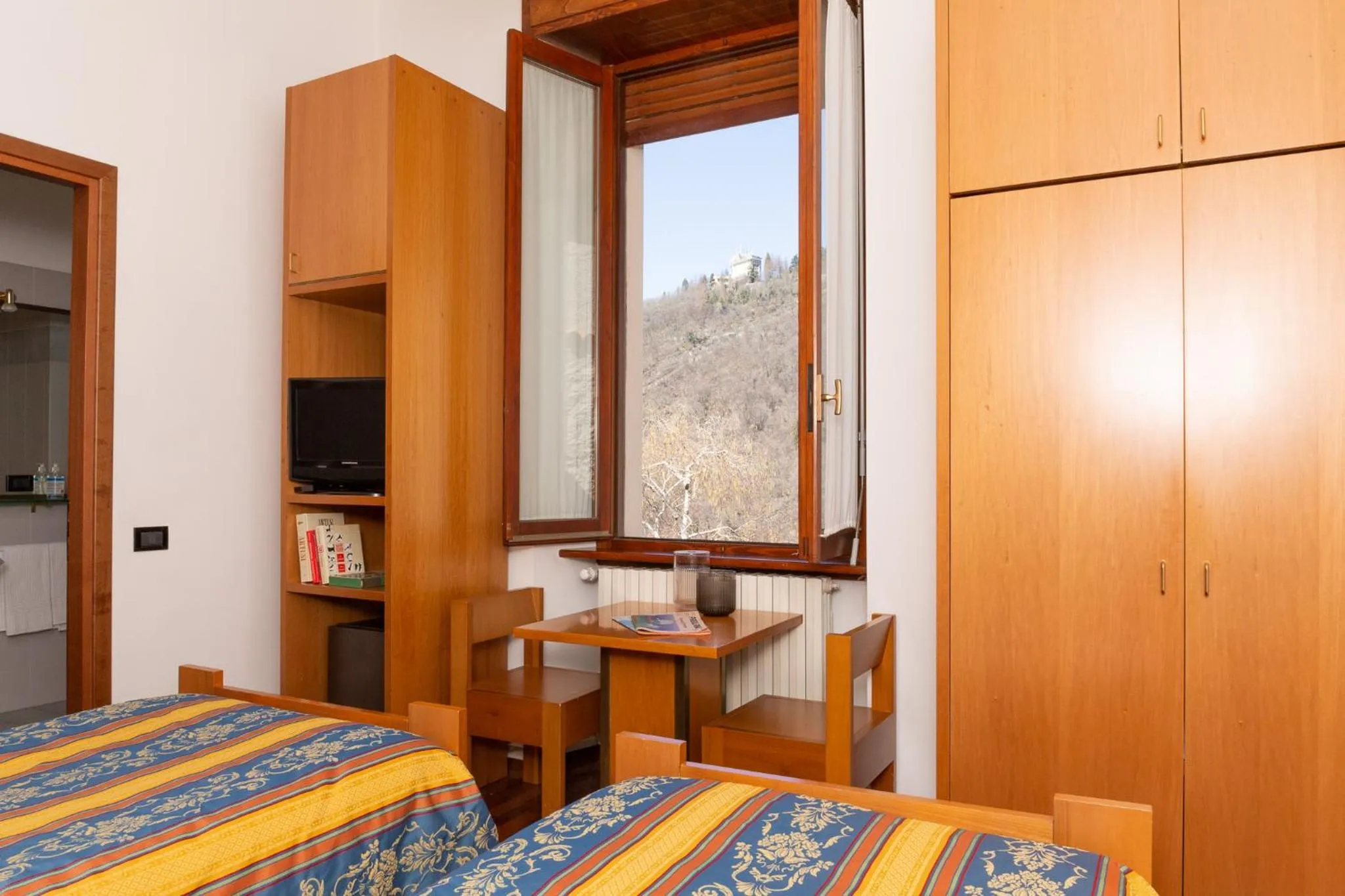 Photo of the whole room, Bed in Albergo Sacro Monte Varese