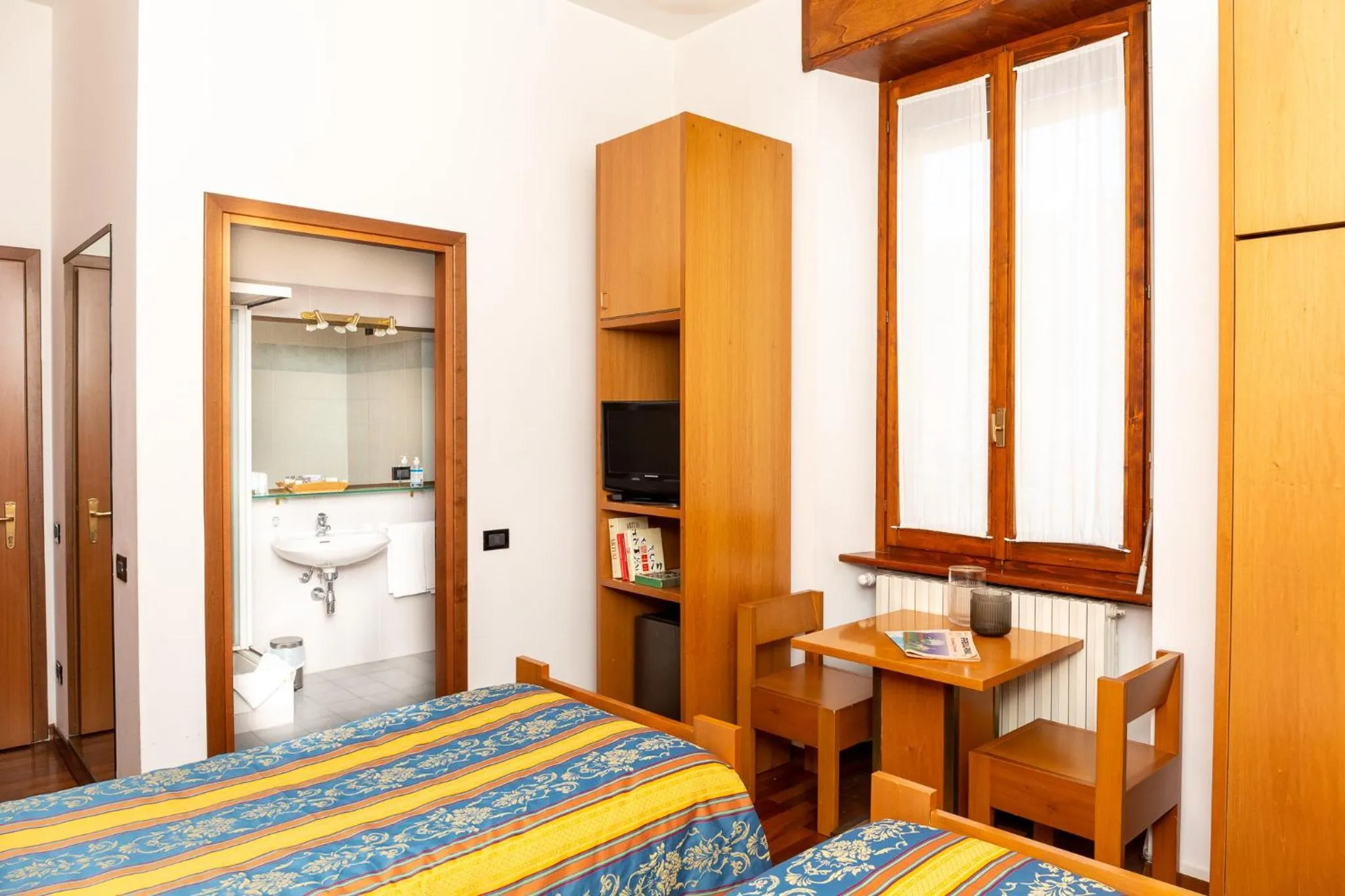 Photo of the whole room, Bed in Albergo Sacro Monte Varese