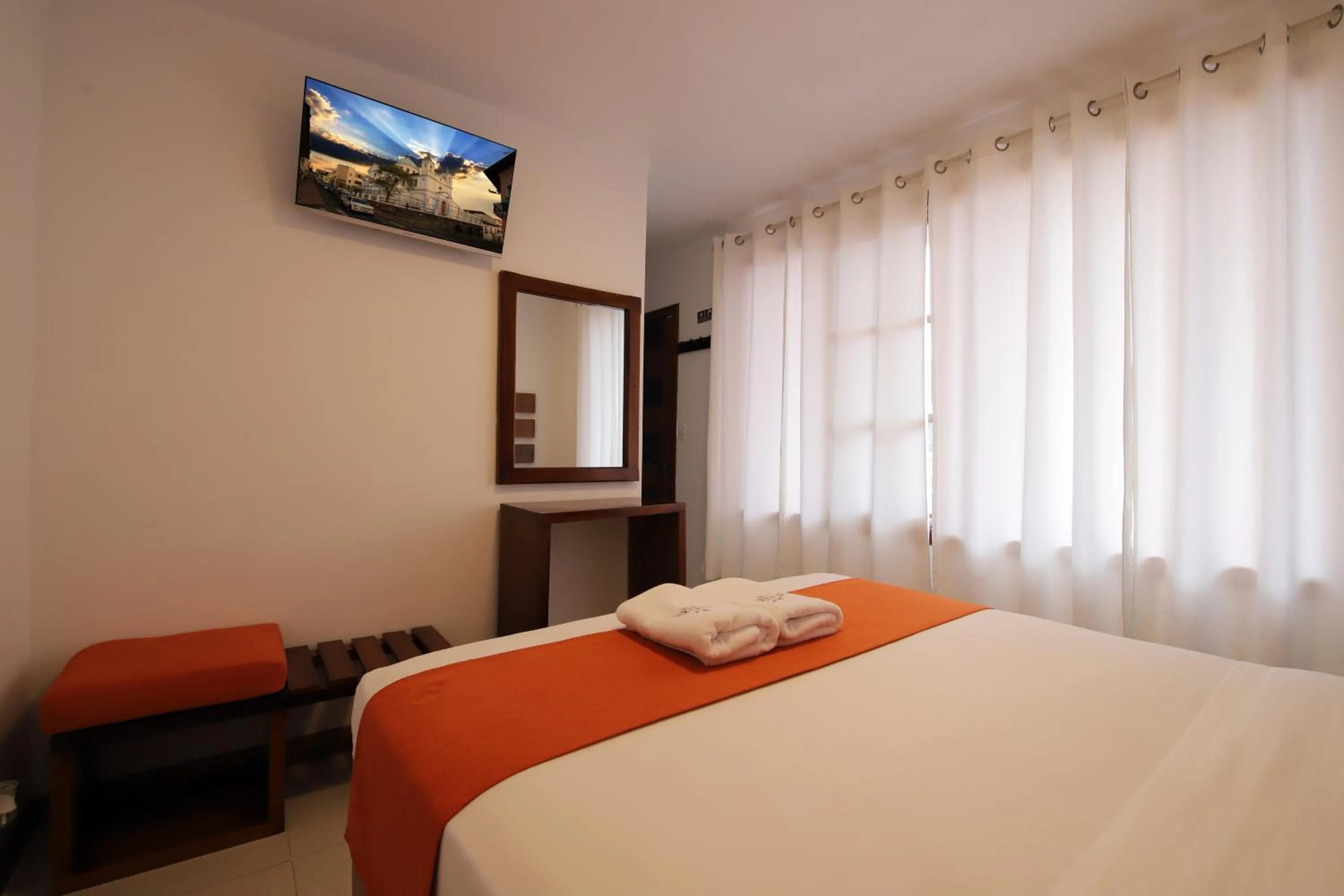 Bed in La Posada de Mindo