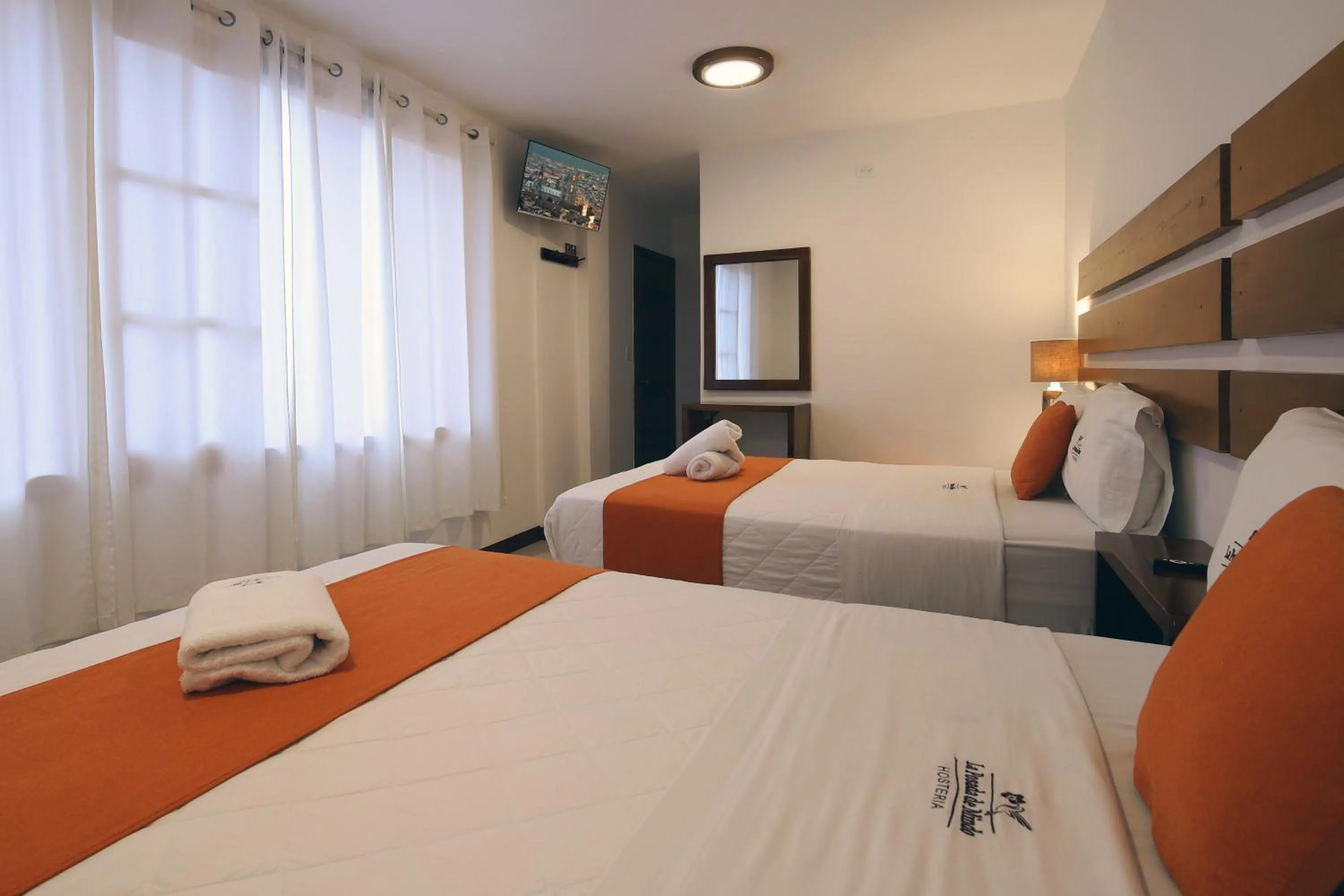 Bed in La Posada de Mindo