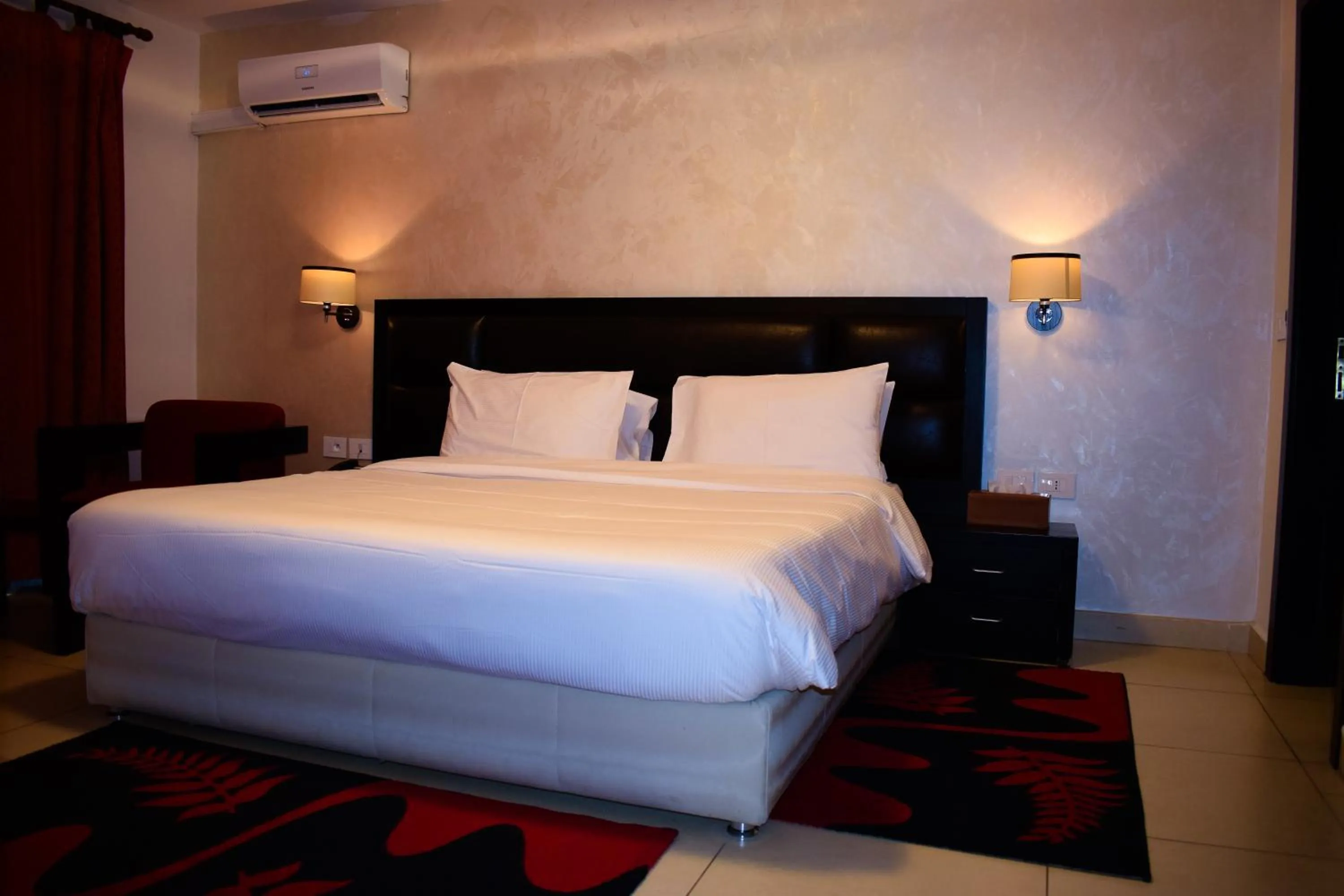 Bed in Hotel Palm Beach