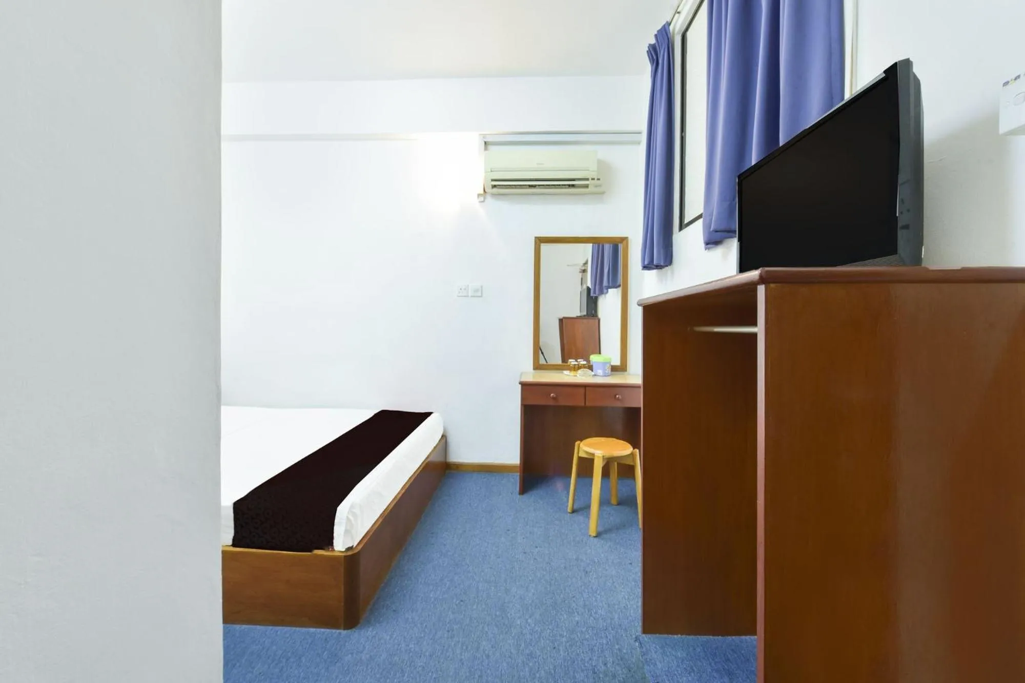 Bedroom in Hotel Jalan Bukit Ubi Formerly Bumimas