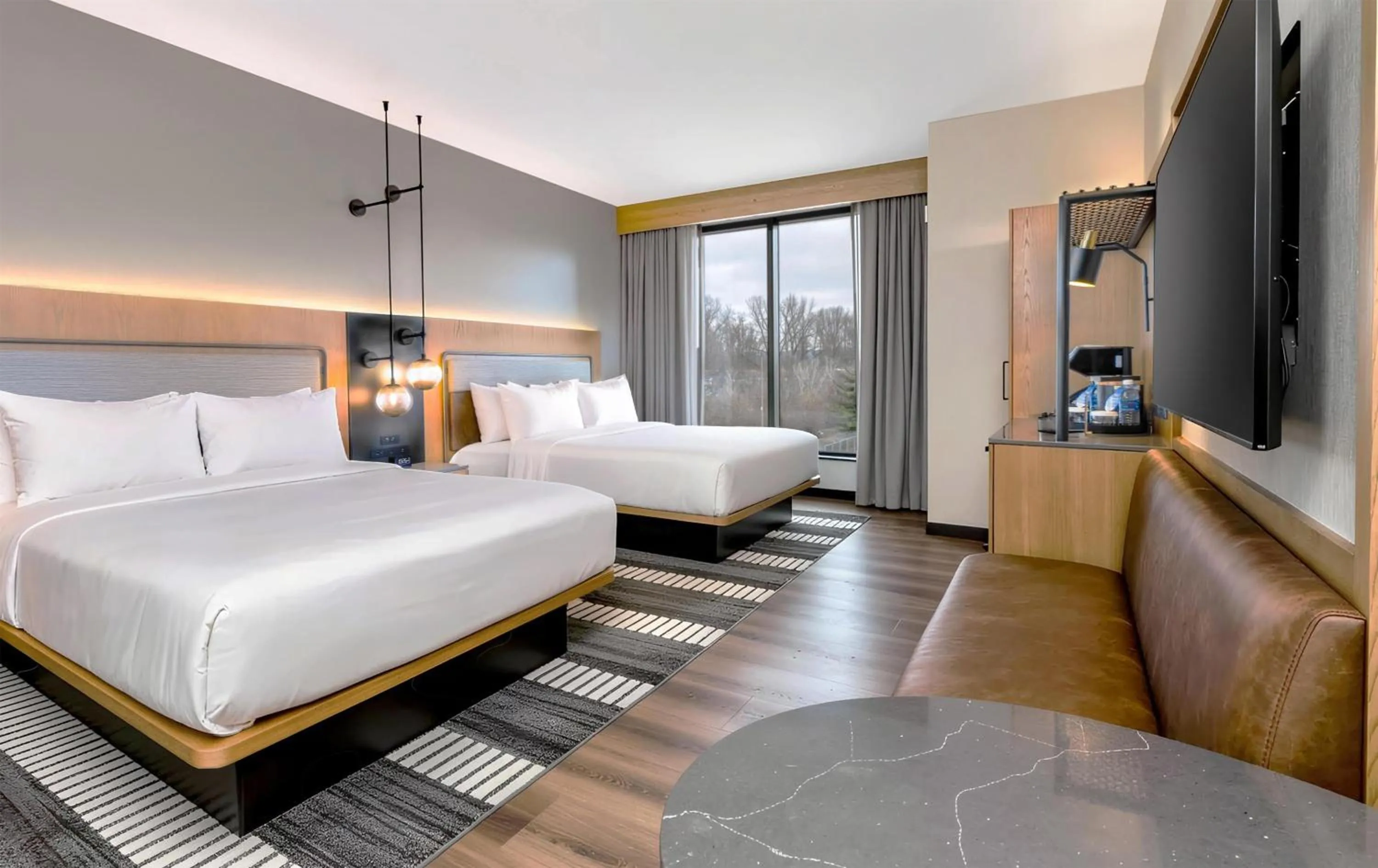 Bed in The Key Hotel Dubuque, Tapestry Collection By Hilton