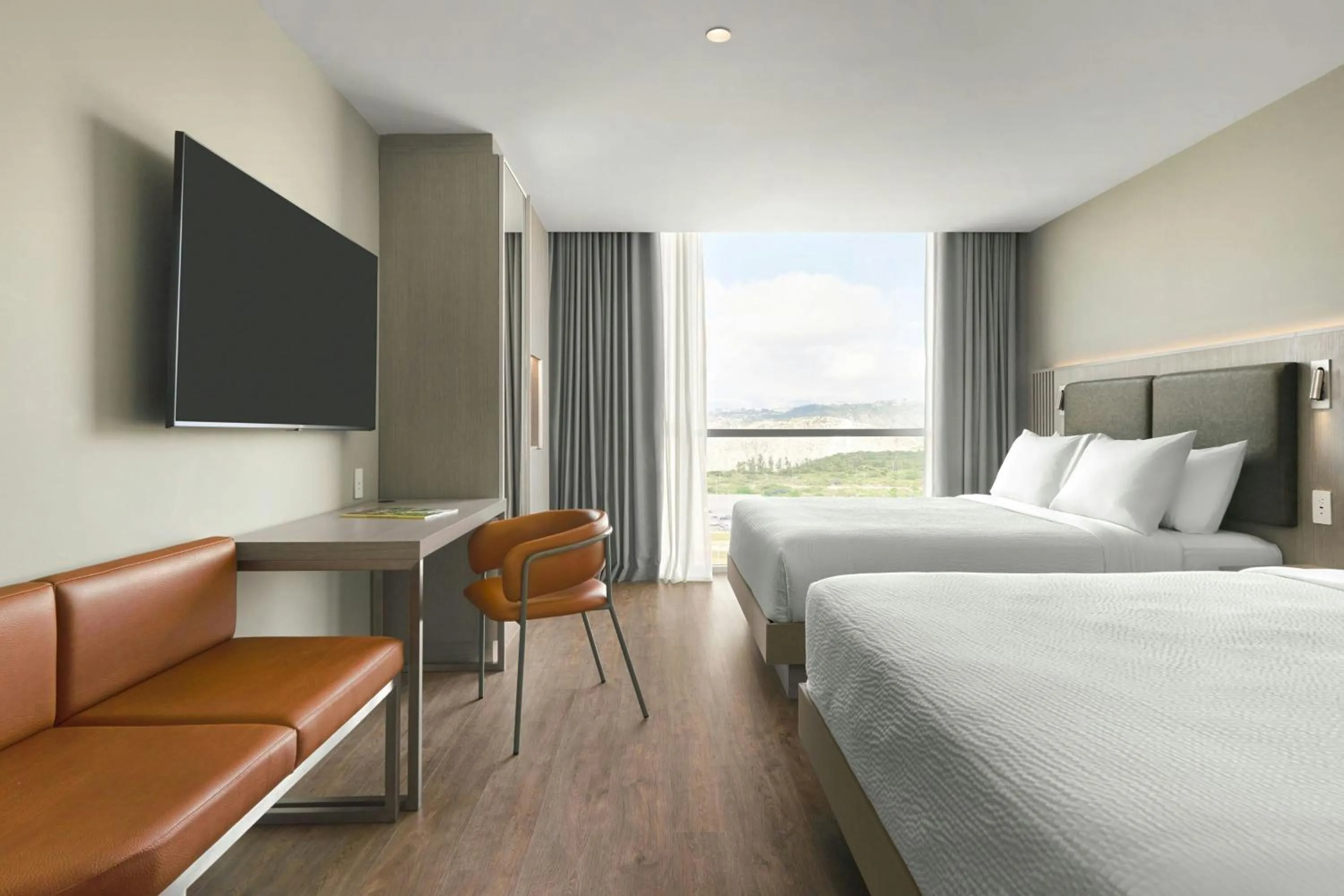 Photo of the whole room, Bed in Courtyard by Marriott Quito Airport