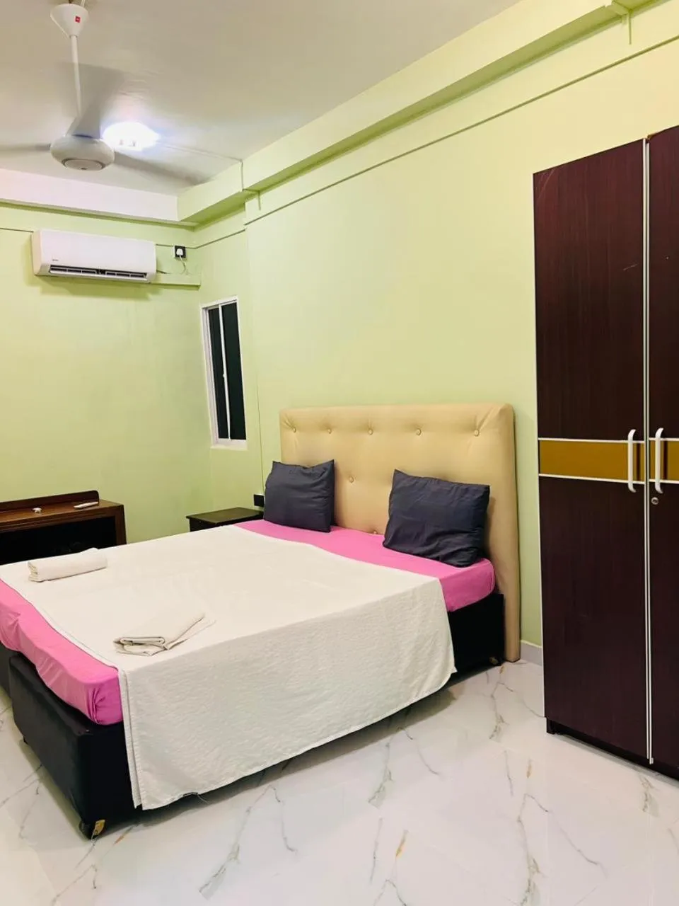 Bed in Metro City Hotel