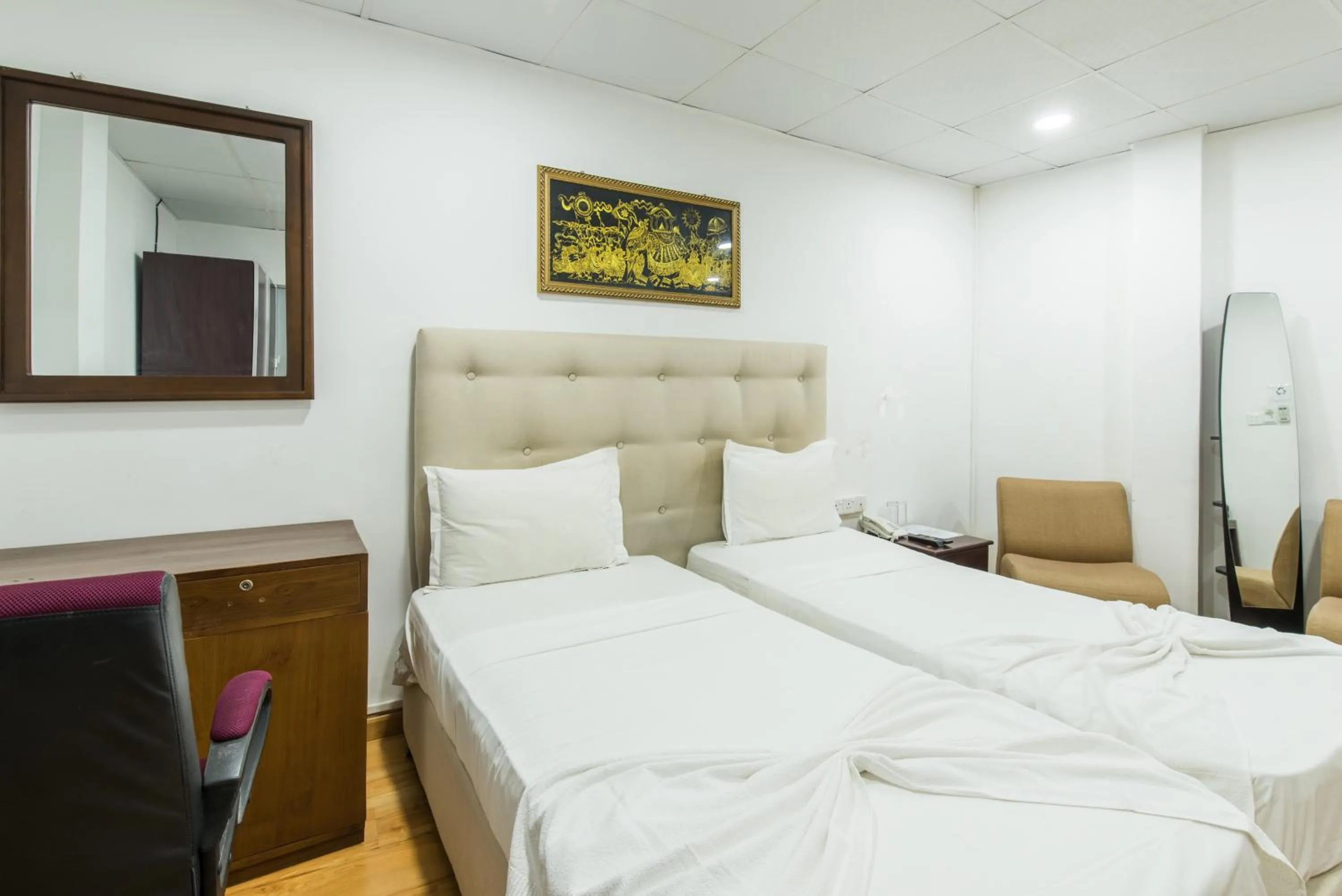 Bed in Metro City Hotel