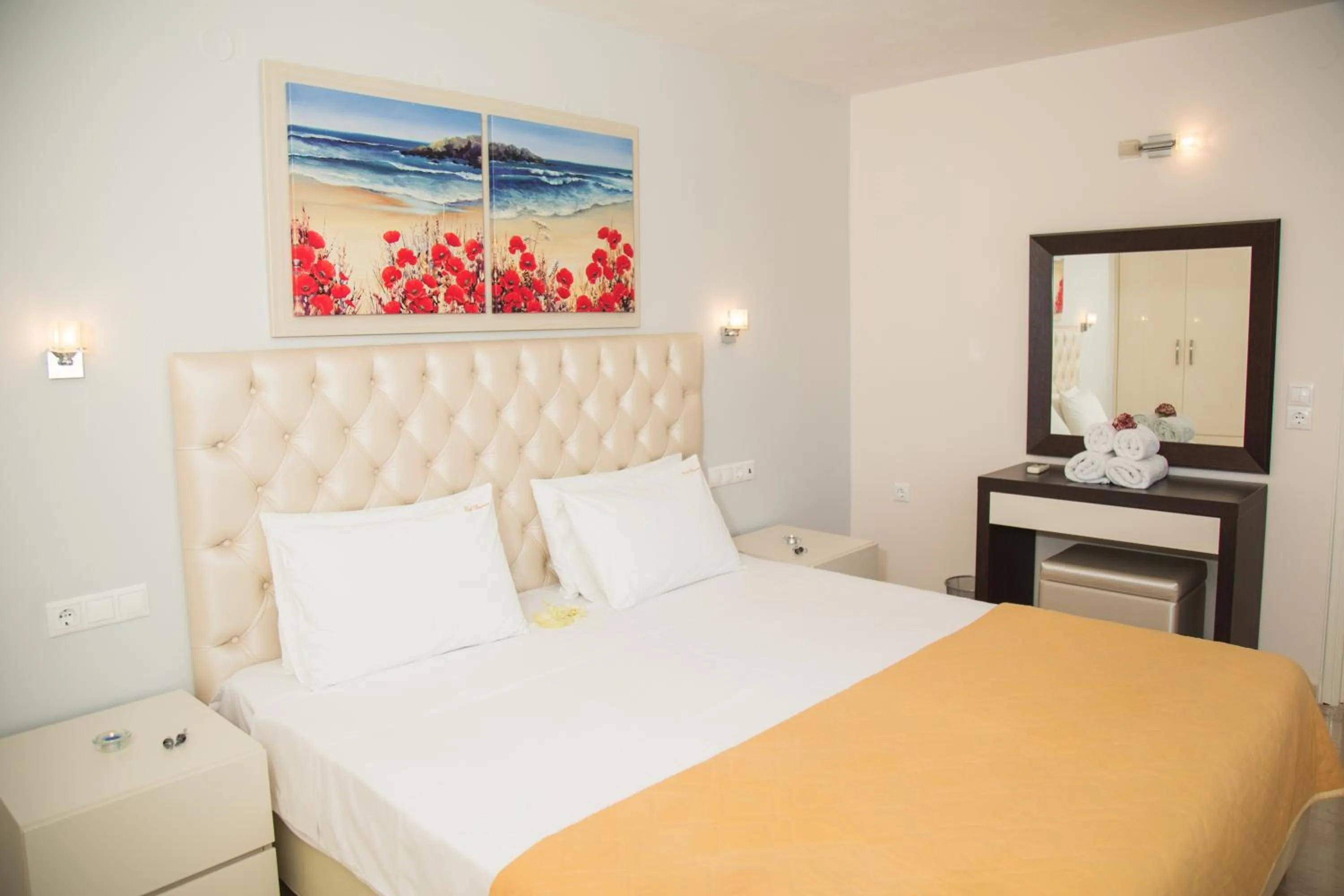 Bedroom, Bed in Brentanos Apartments - A - View of Paradise