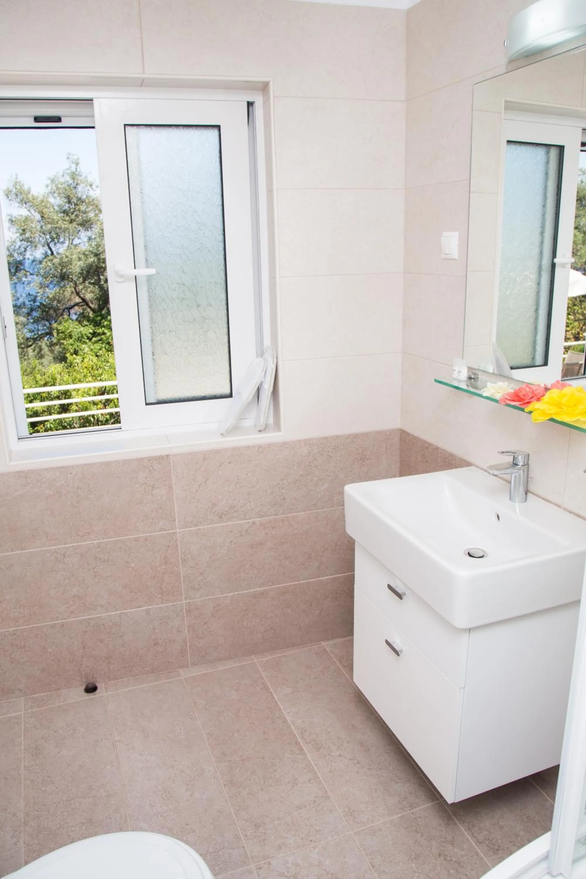 Bathroom in Brentanos Apartments - A - View of Paradise