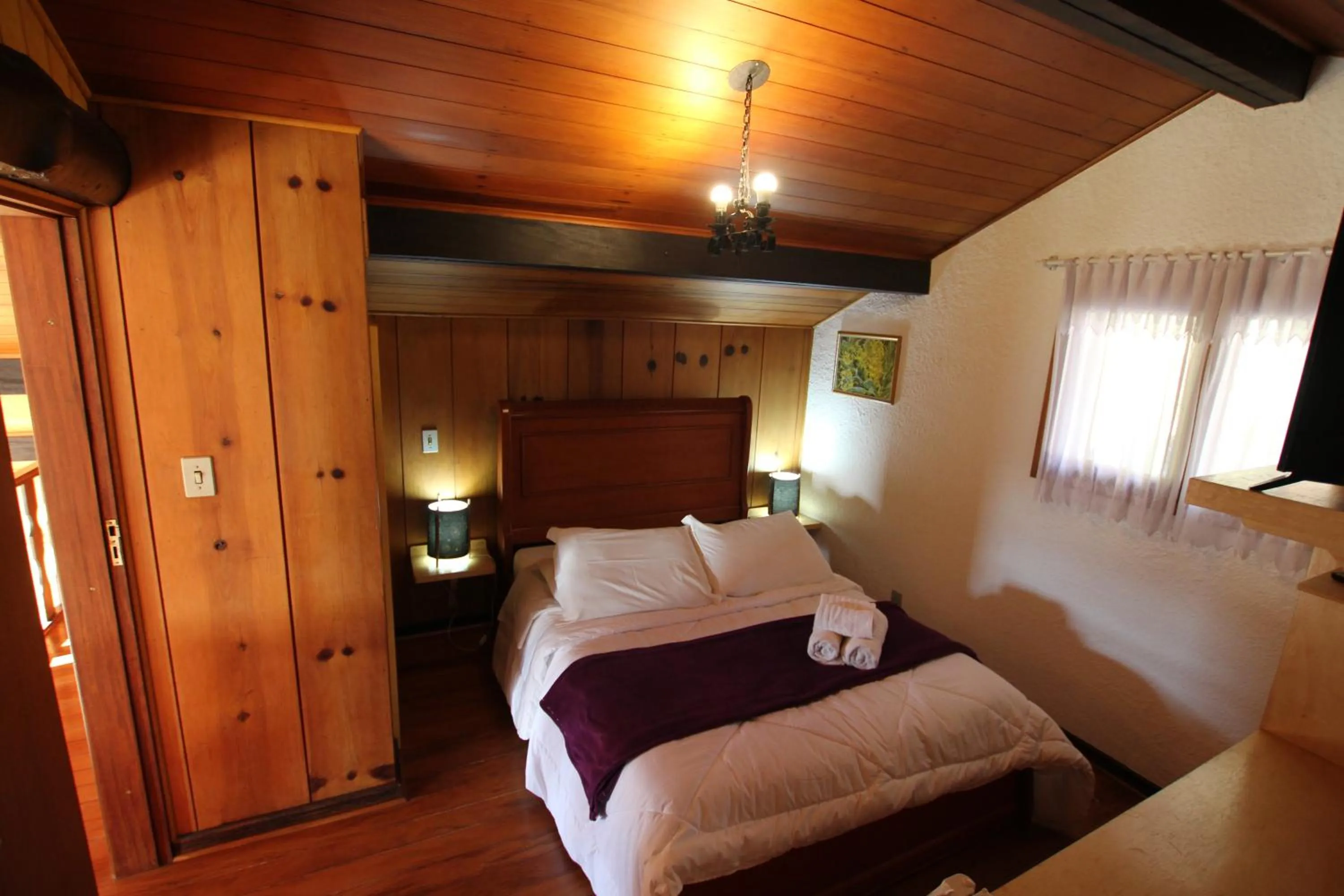 Bed in Pousada Aguia da Montanha