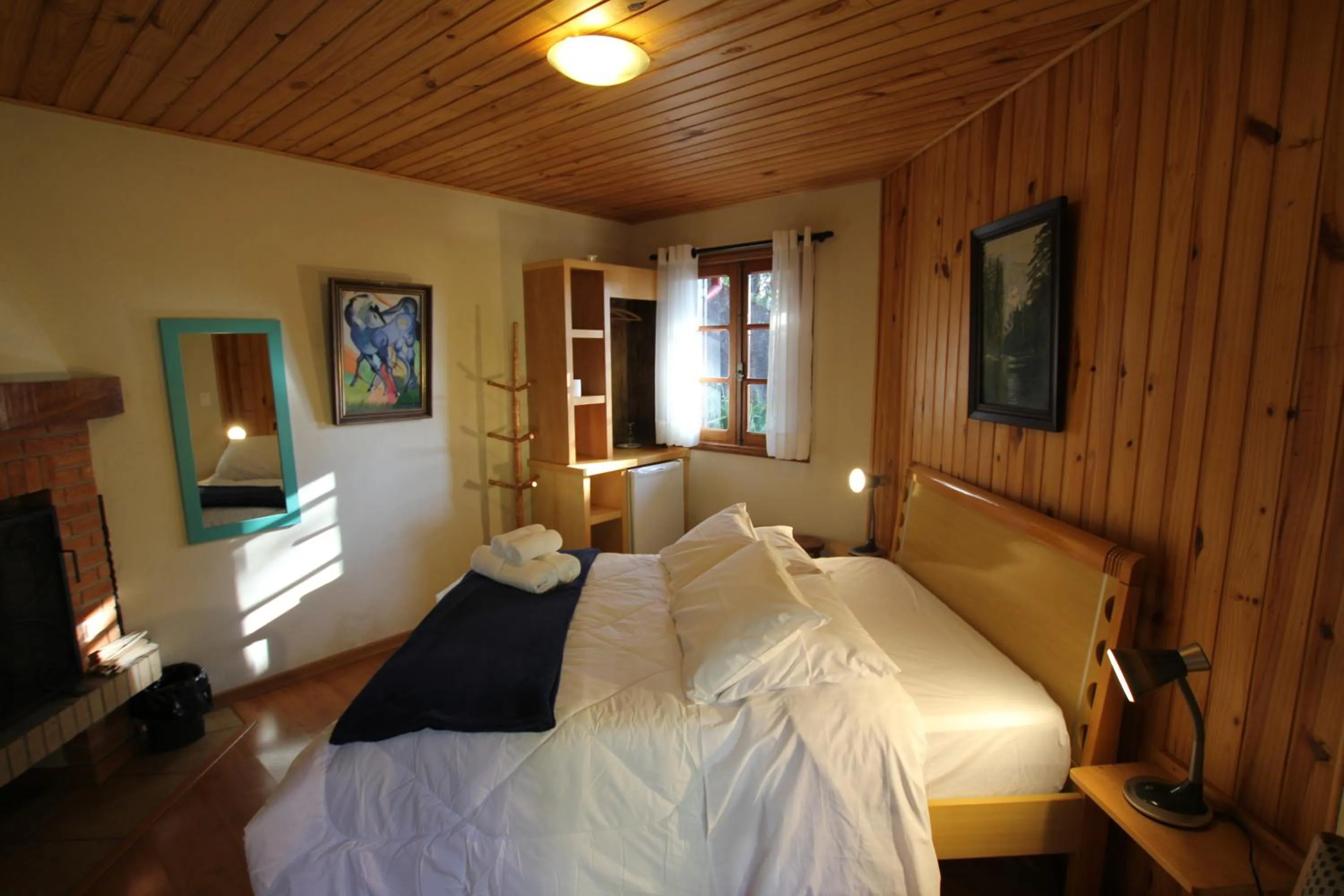 Bed in Pousada Aguia da Montanha