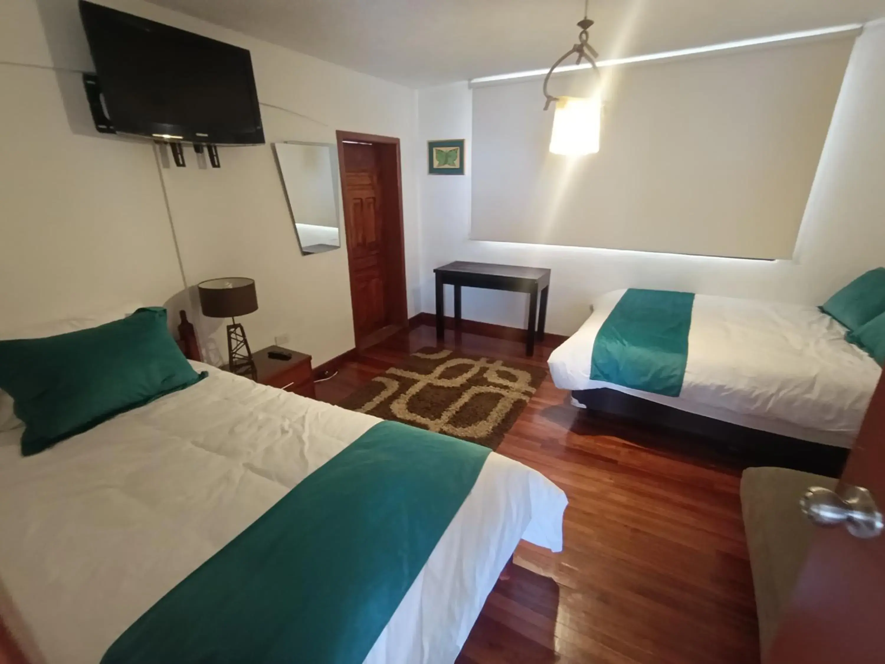 Deluxe Double Room with Extra Bed in Bed and Breakfast La Uvilla Deluxe Double Room with Extra Bed in Bed and Breakfast La Uvilla
