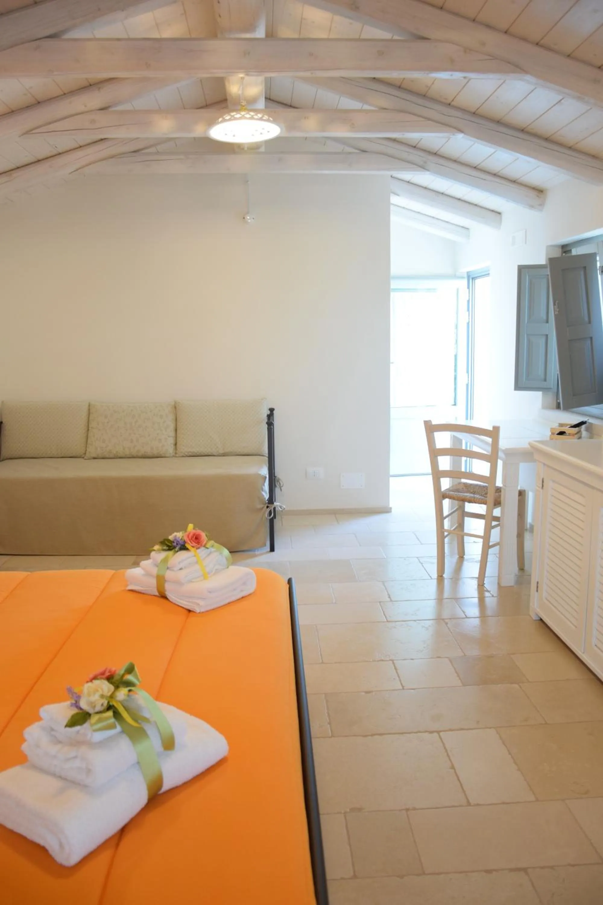 Photo of the whole room in Corte Trullo Sovrano B&B