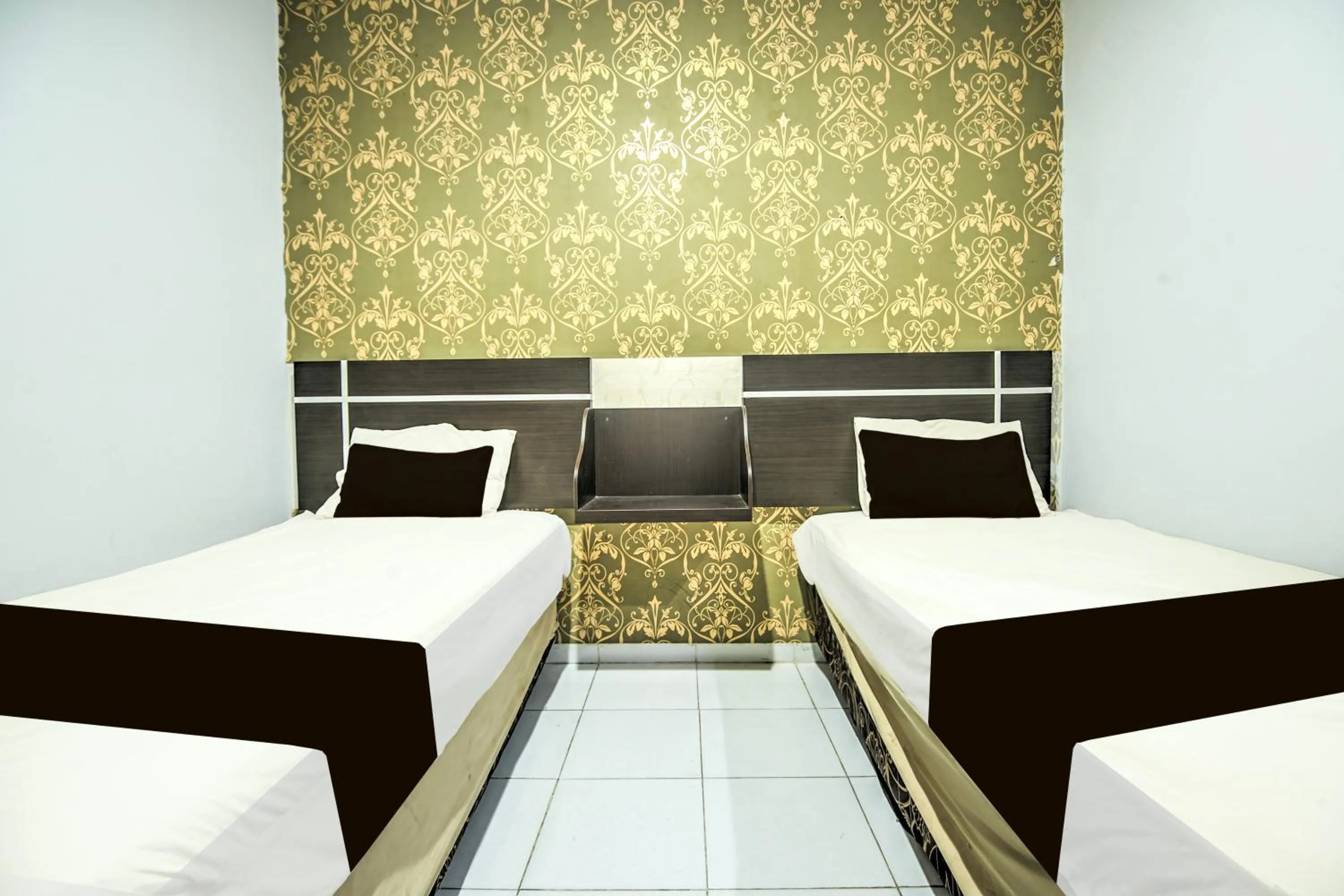 Bedroom, Bed in Hotel O Makassar near Mall Panakukang formerly Hotel Lucky Inn Makassar