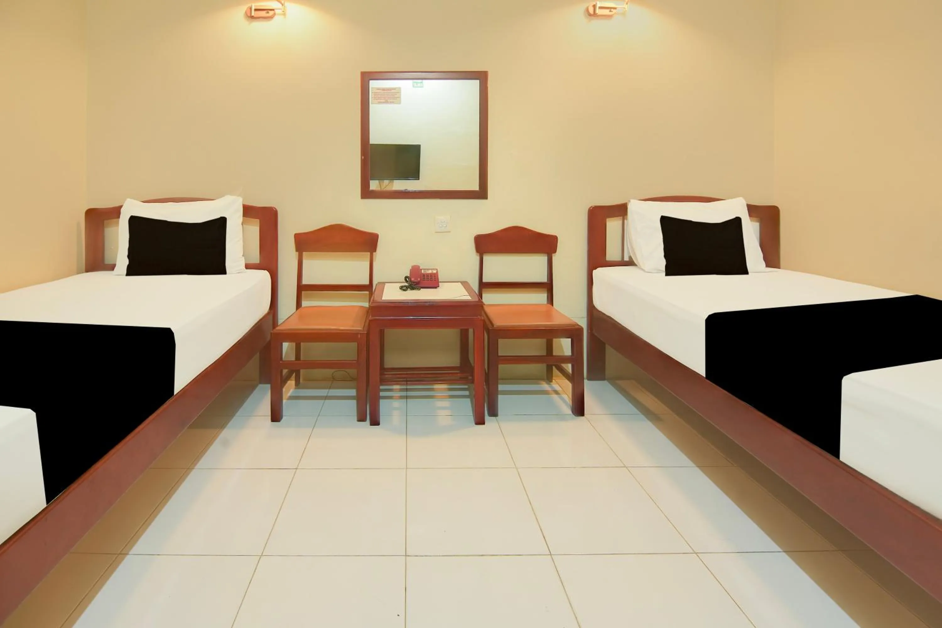 Bedroom, Bed in Hotel O Makassar near Pantai Losari formerly Hotel Tiara Sari