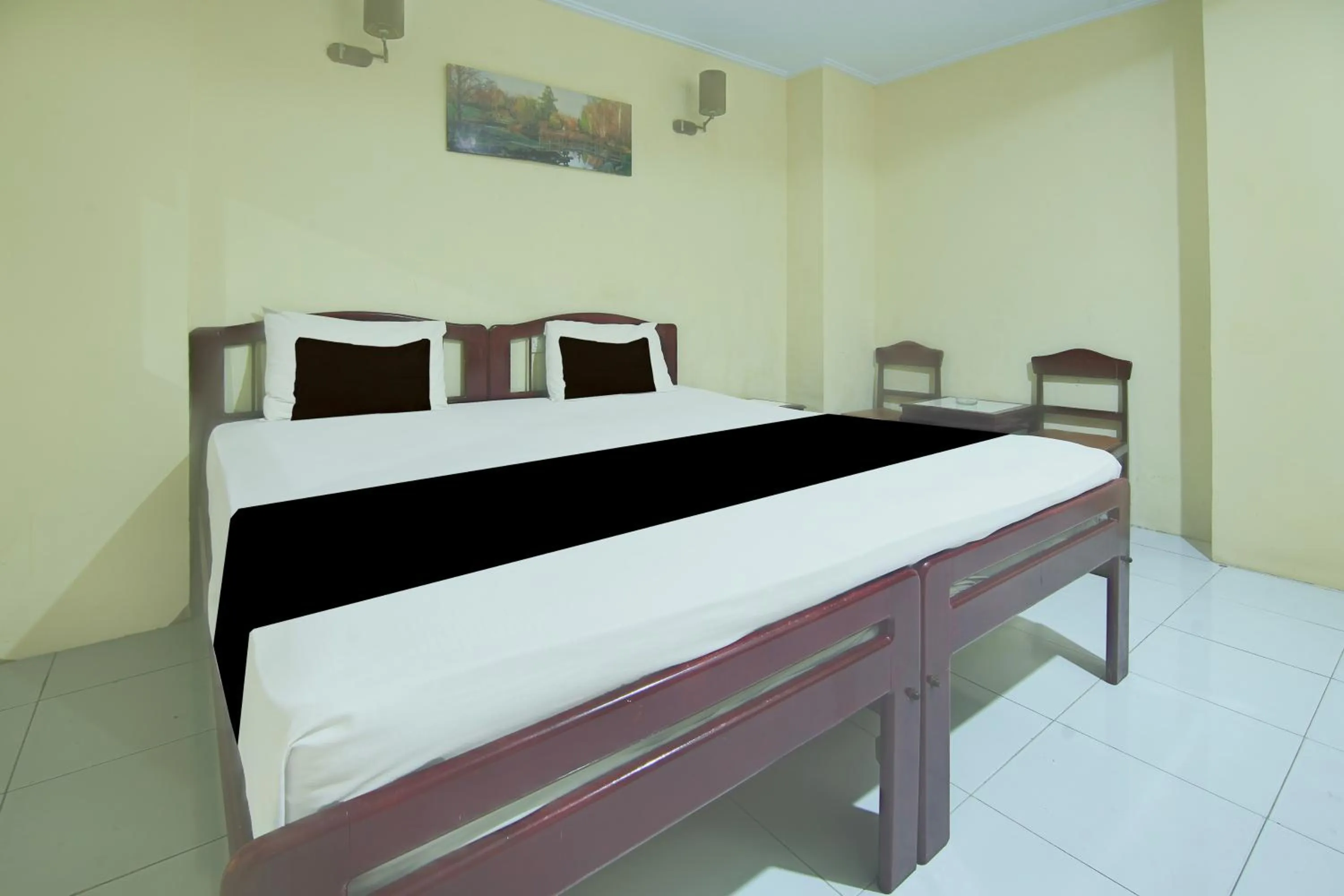 Bedroom, Bed in Hotel O Makassar near Pantai Losari formerly Hotel Tiara Sari