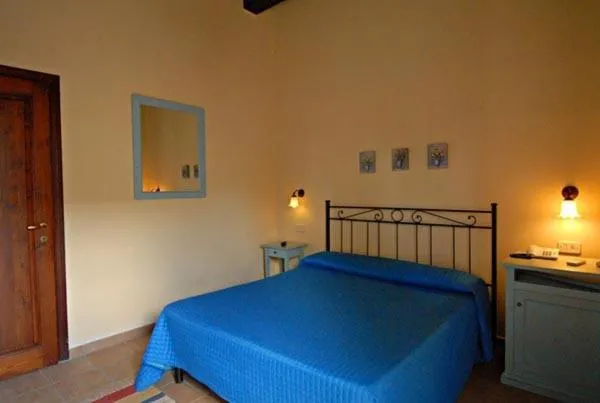 Photo of the whole room, Bed in Podere Turicchio
