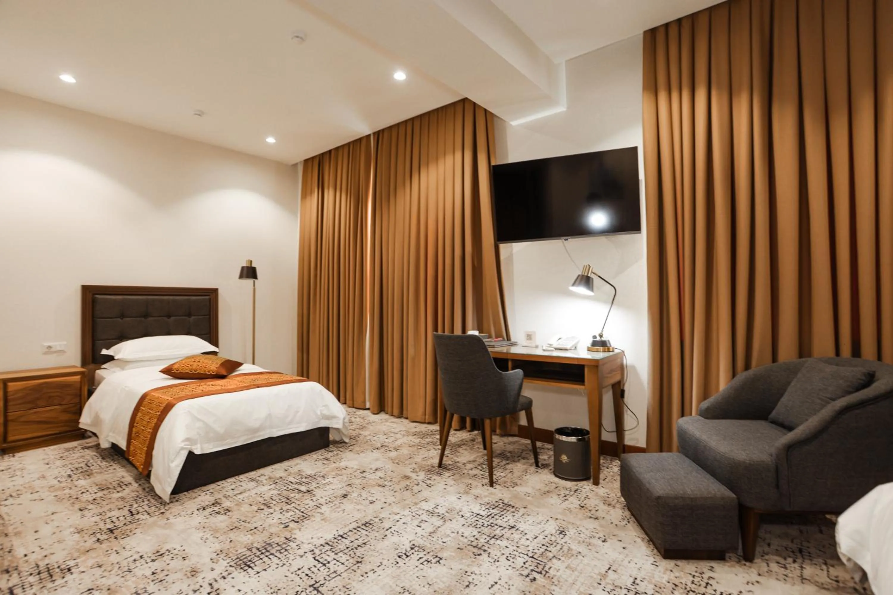 Bed in Bogishamol Hotel