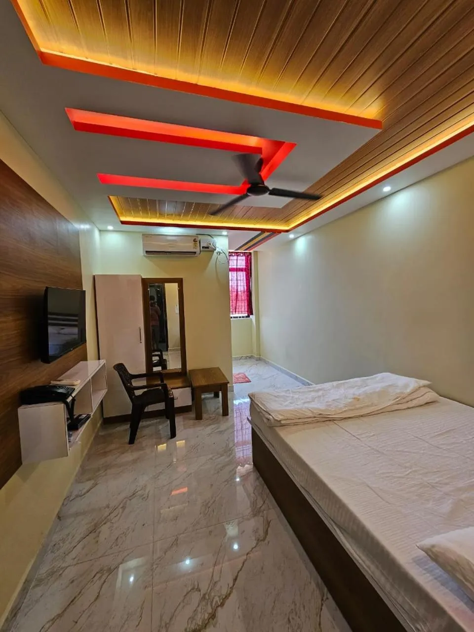 Bed in Ashwini Hotel And Lodging