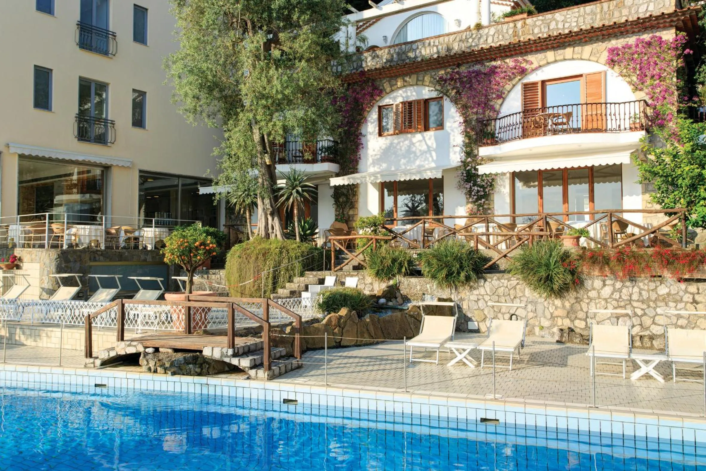 Swimming pool in Via Capo Rooms