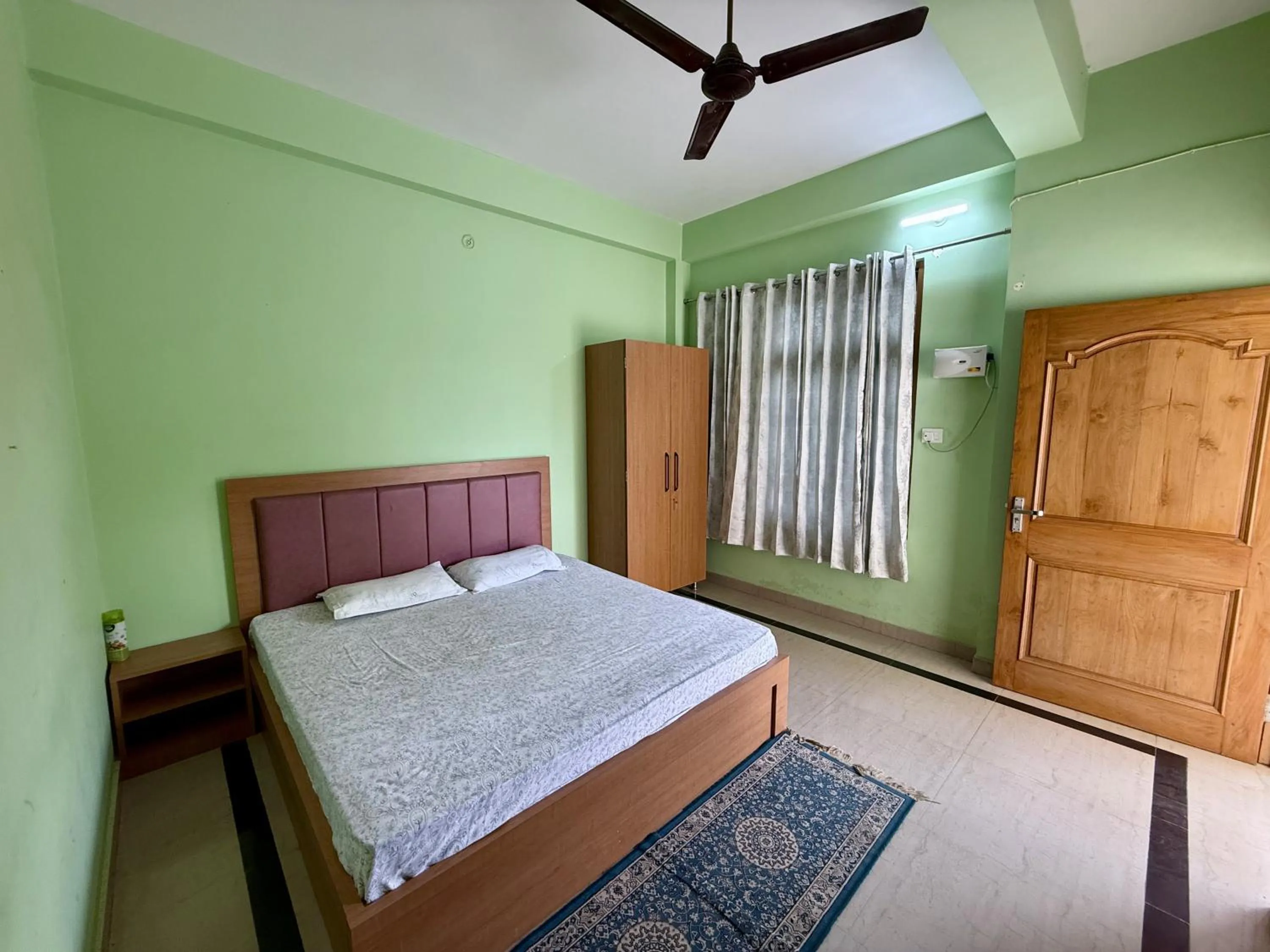 Bed in Madhuraj Villa Homestay
