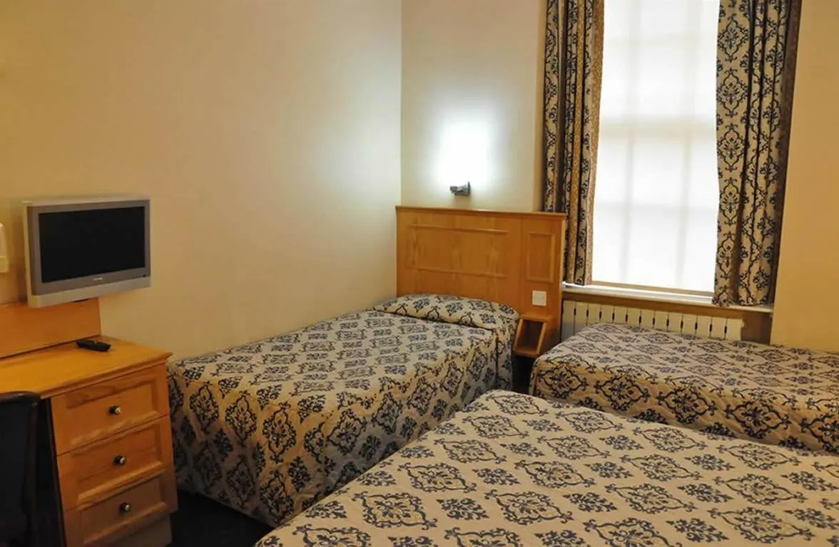 Photo of the whole room, Bed in Olympic House Hotel