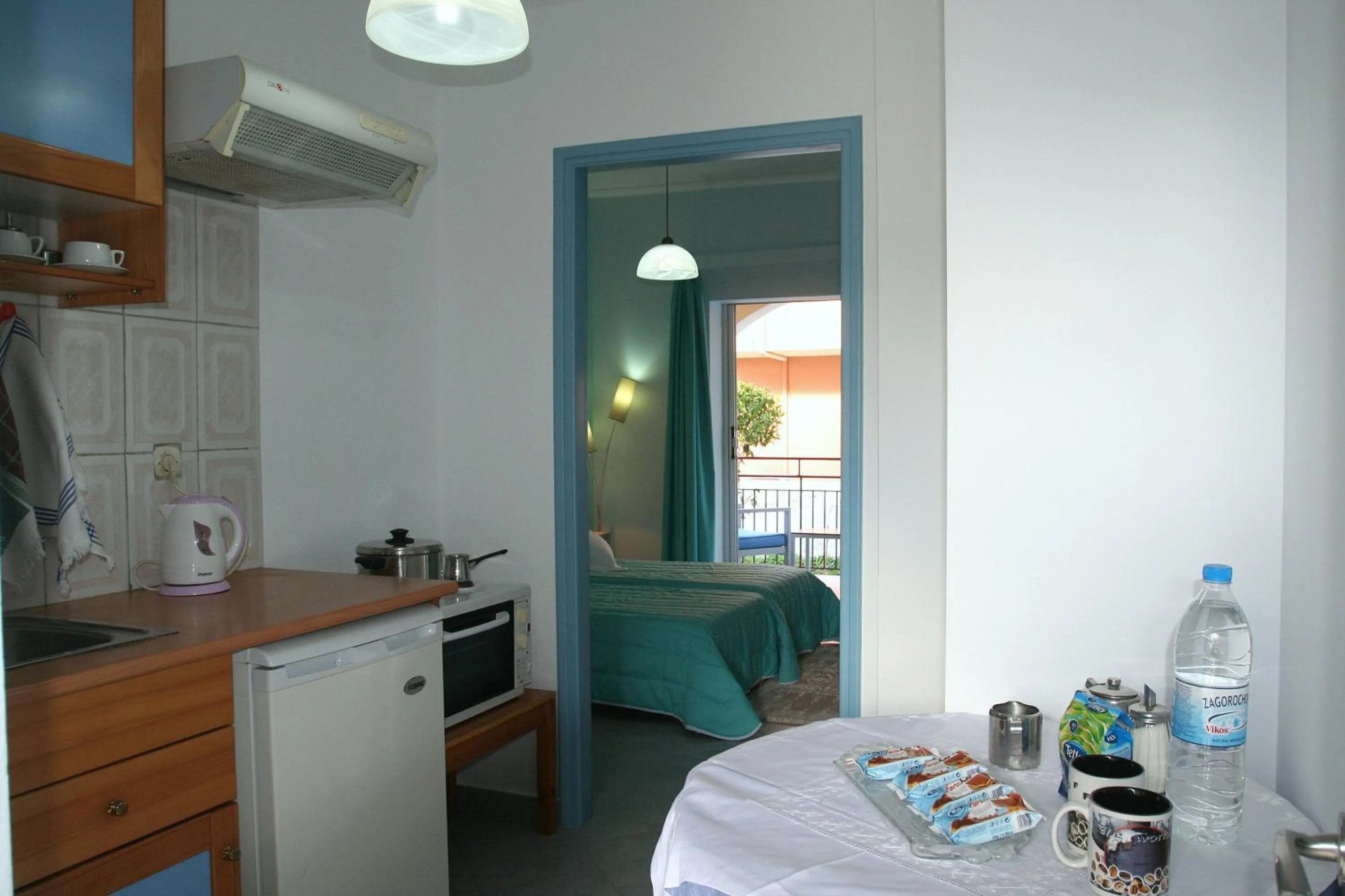 Kitchen or kitchenette, Bed in Roda Pearl Resort