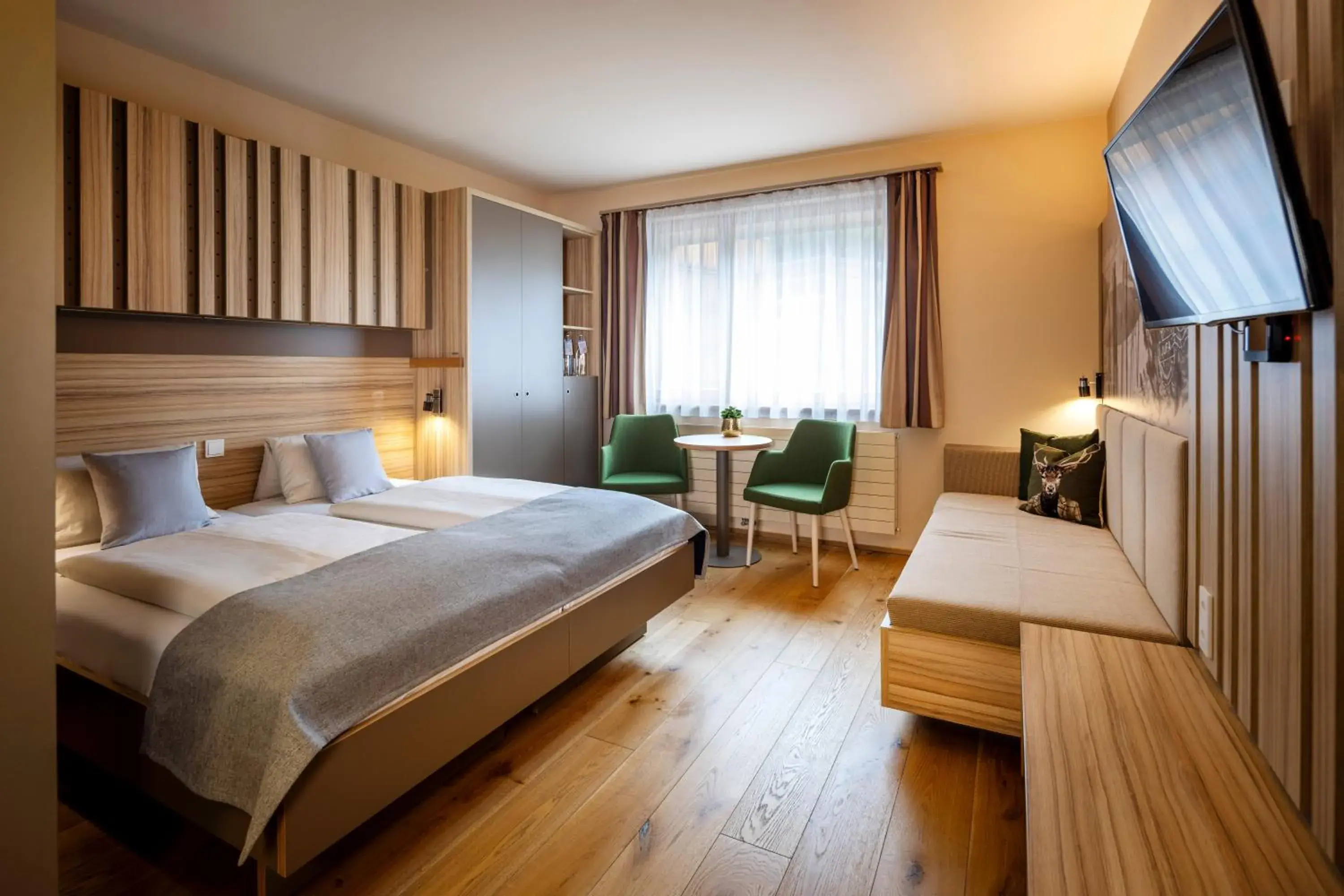 Quadruple Room in JUFA Hotel Malbun Quadruple Room in JUFA Hotel Malbun