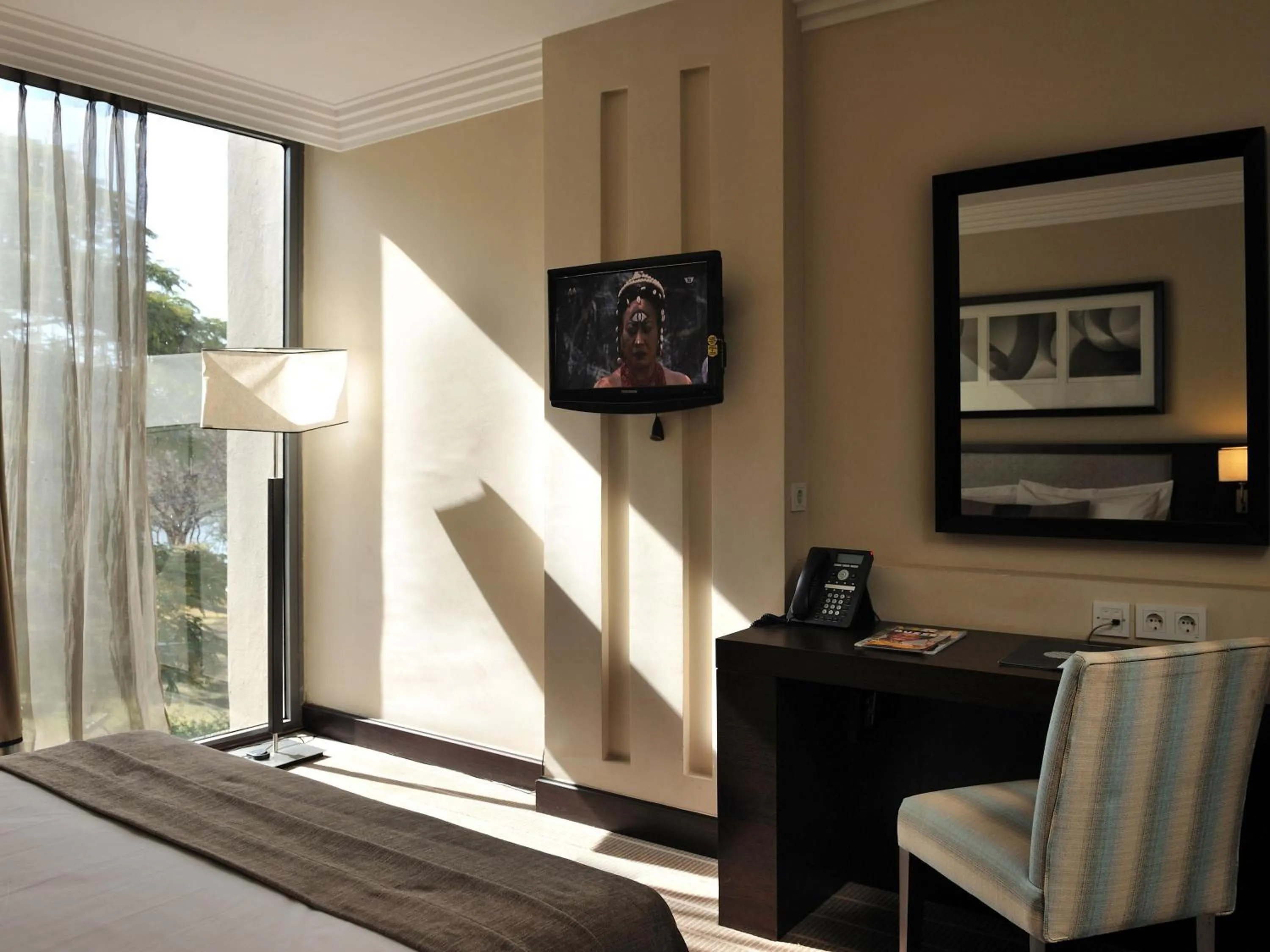 Bedroom, Bed in Pullman Lubumbashi Grand Karavia.